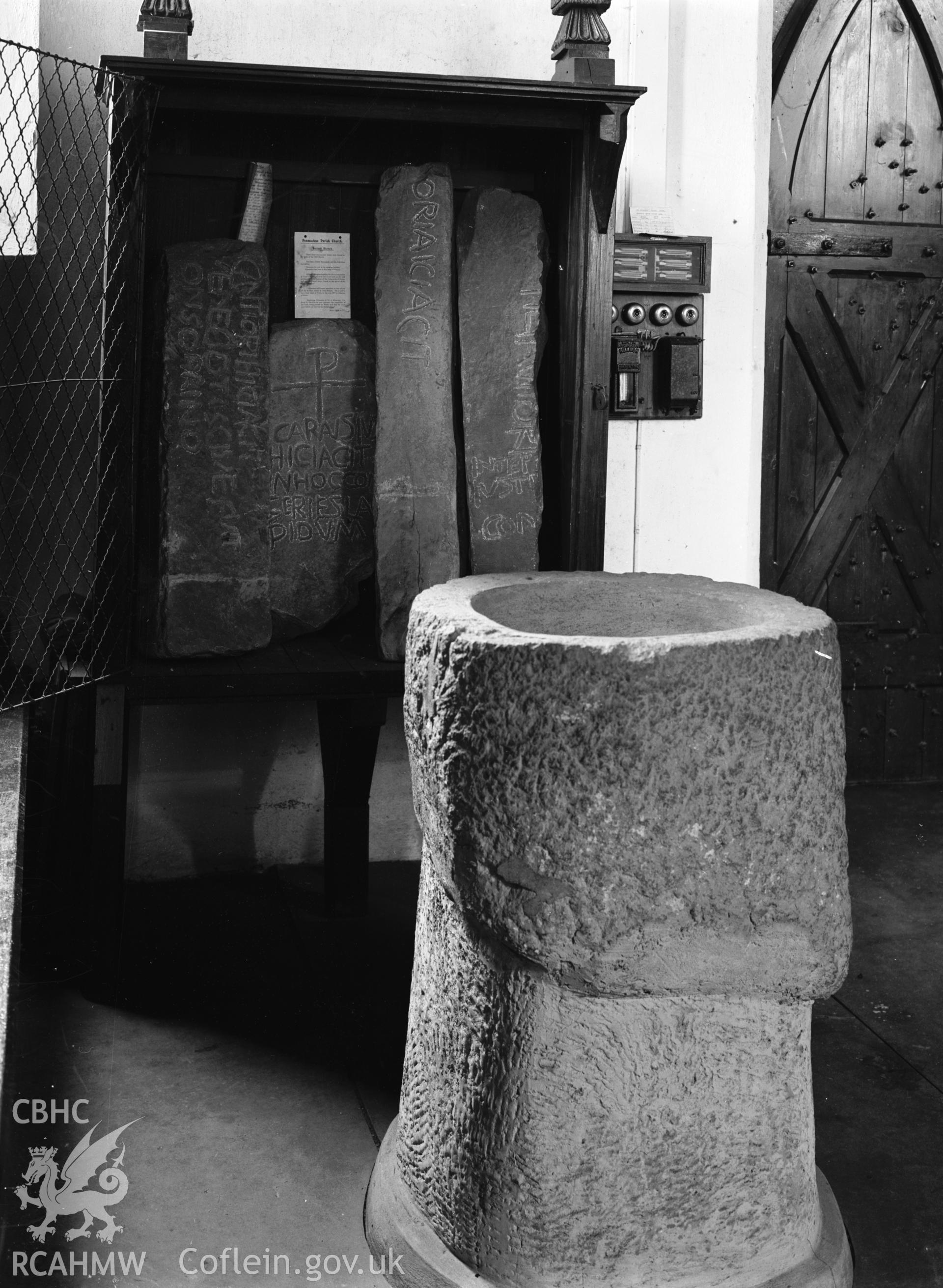 Interior view showing font and stones.