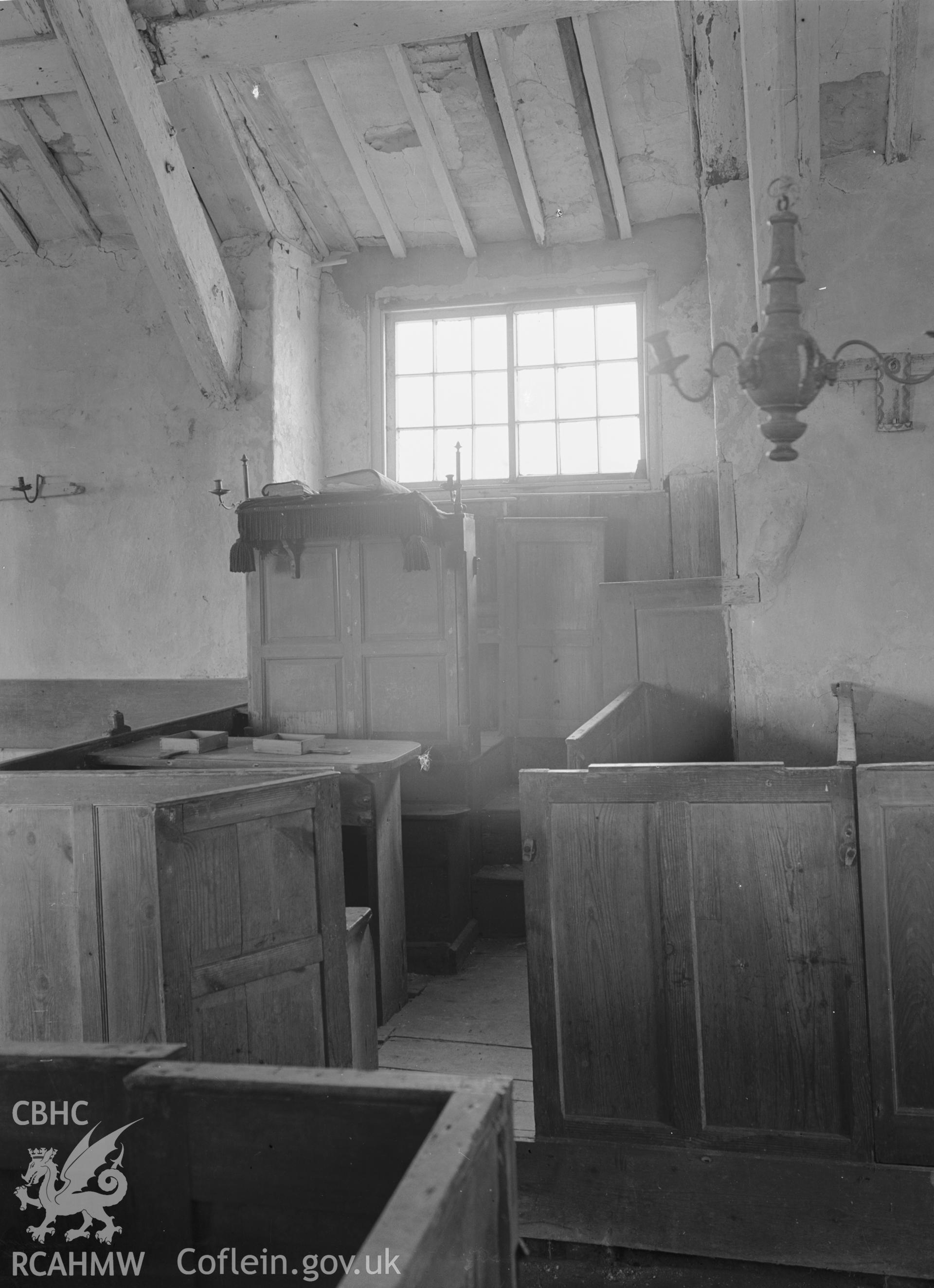 Interior view showing the pulpit and north window.