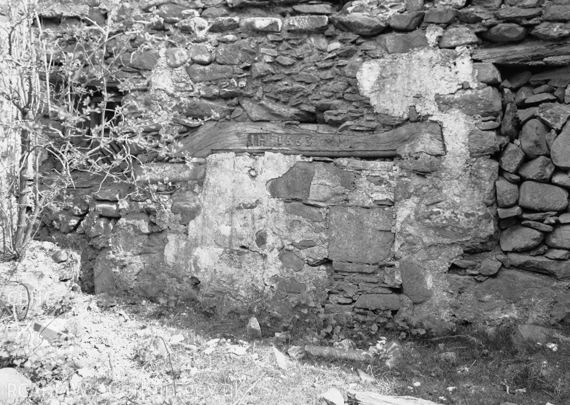 Interior view of ruins showing fireplace in south room