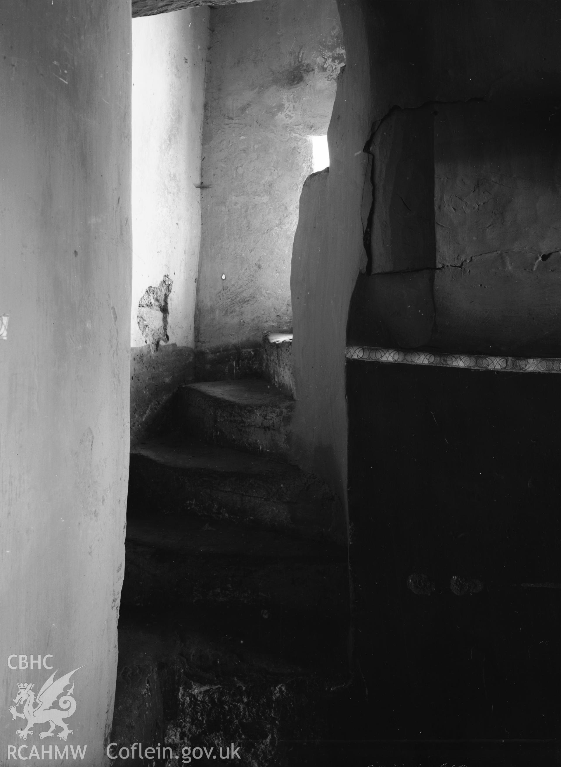 Interior view showing stone staircase.