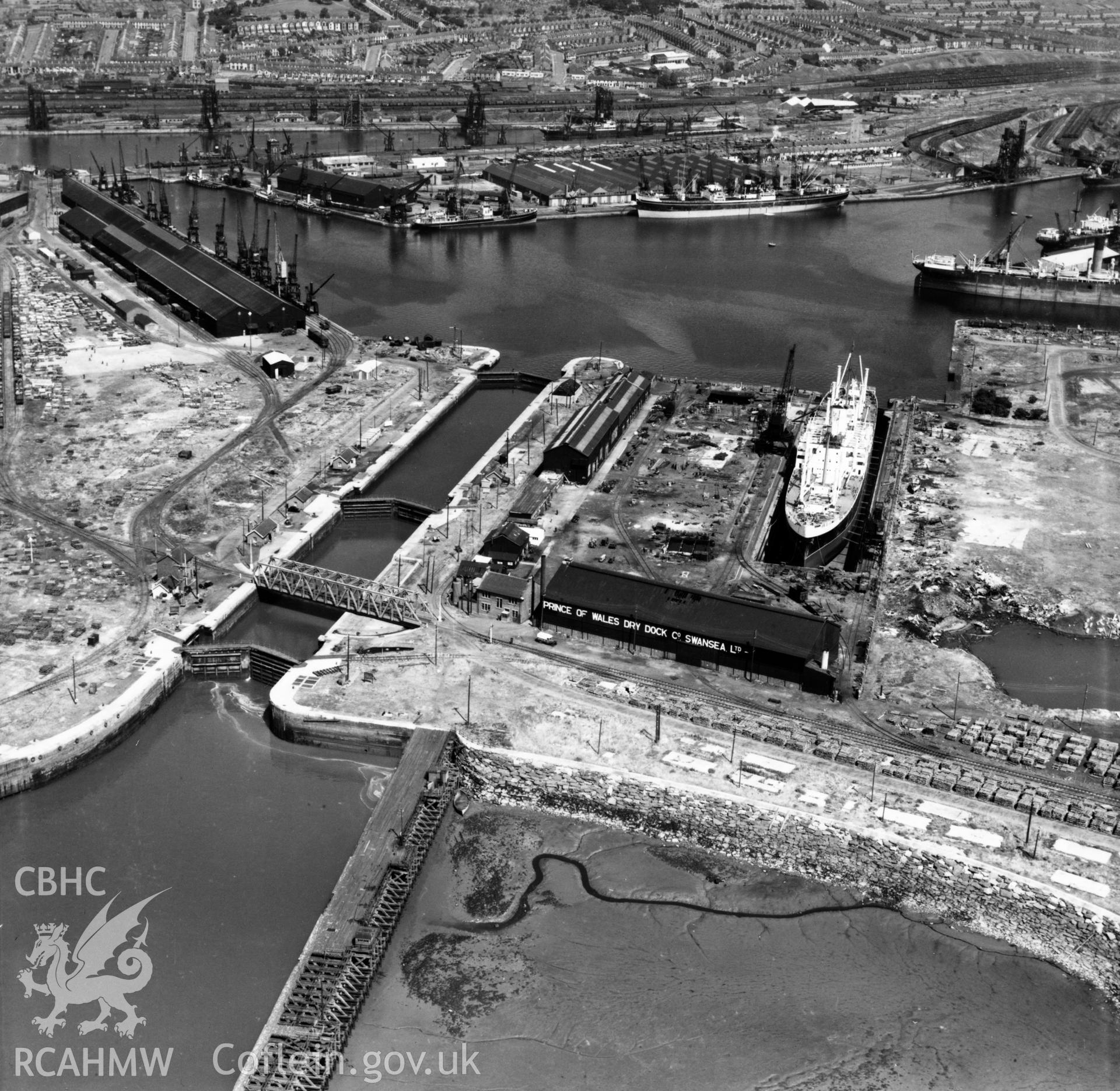 View of Palmers dry dock, Prince of Wales Dry Dock Co. Ltd., Swansea. Oblique aerial photograph, 5?" cut roll film.