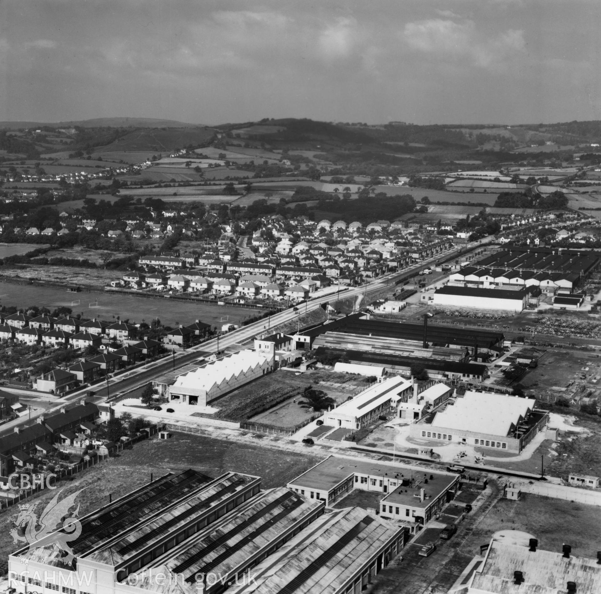 General view of factories and government buildings including the RO factory and new Inland Revenue buildings at Llanishen. Oblique aerial photograph, 5?" cut roll film.