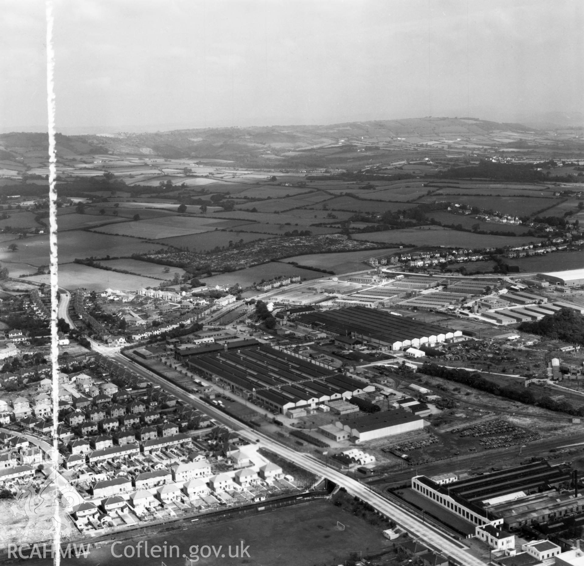 General view of factories and government buildings including the RO factory and new Inland Revenue buildings at Llanishen. Oblique aerial photograph, 5?" cut roll film.