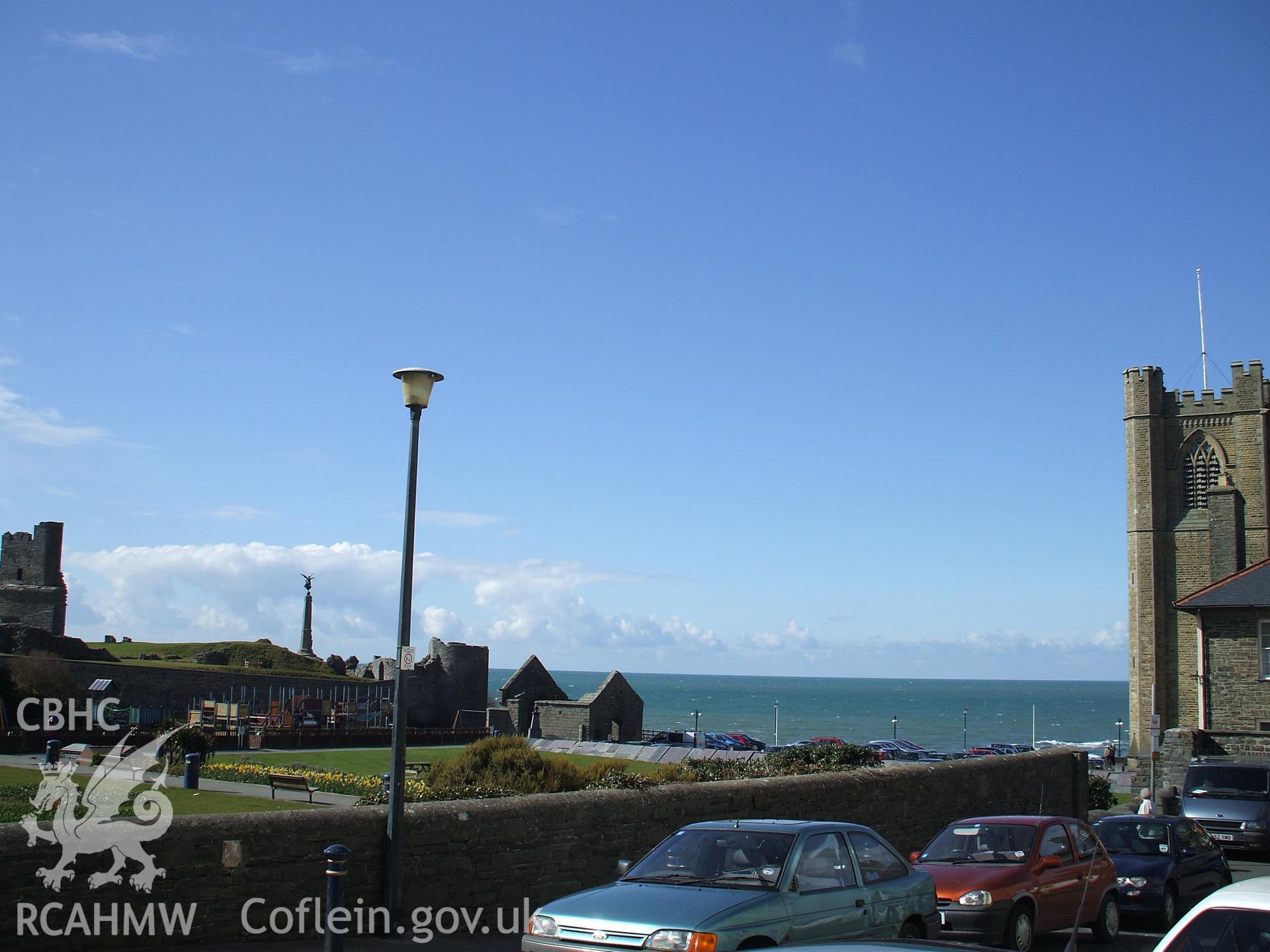 Colour digital photograph showing Aberystwyth Castle and part of the exterior of St. Michael's Church.