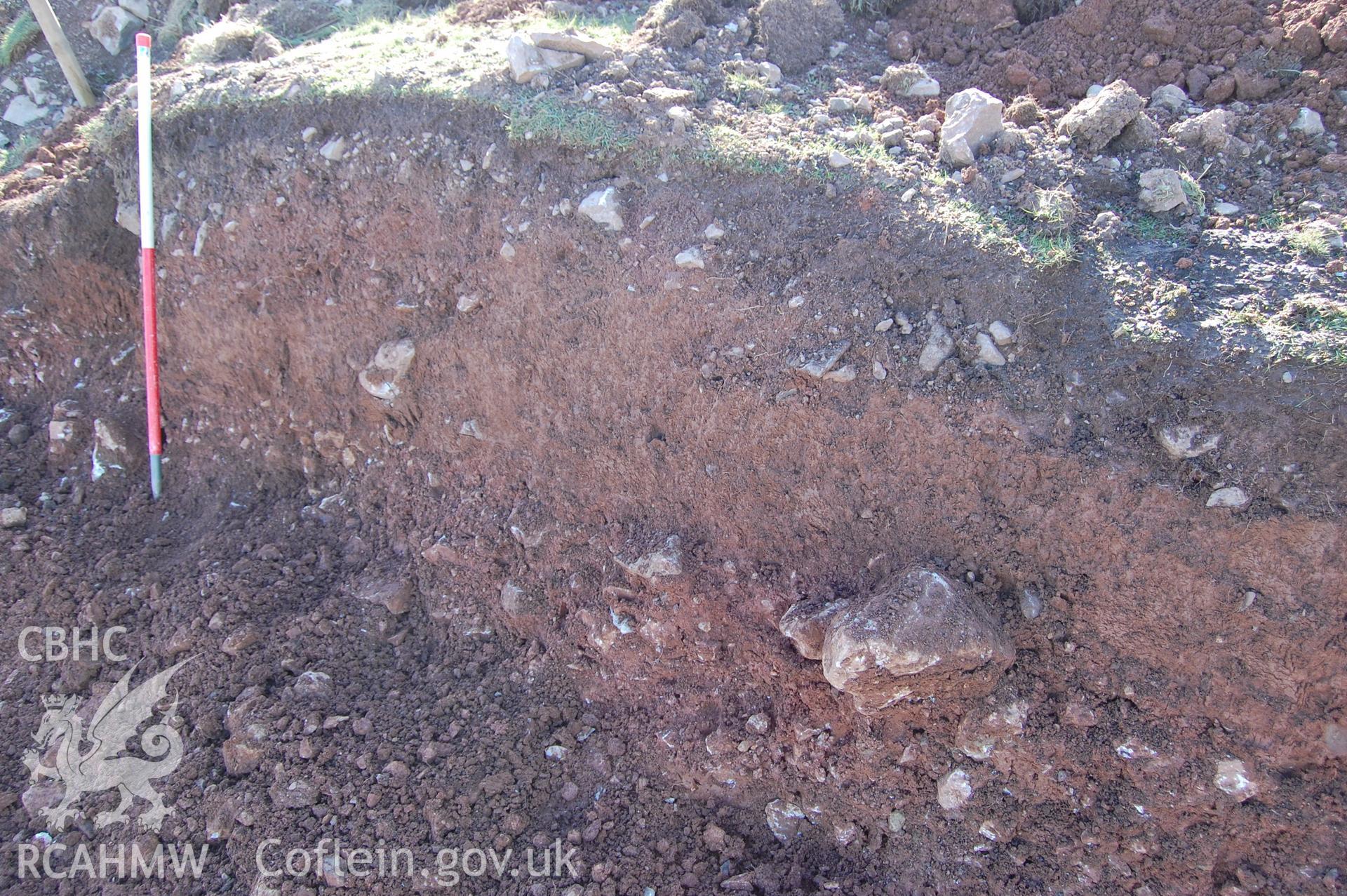 Digital photograph showing a section of mound 005 with 002 below.