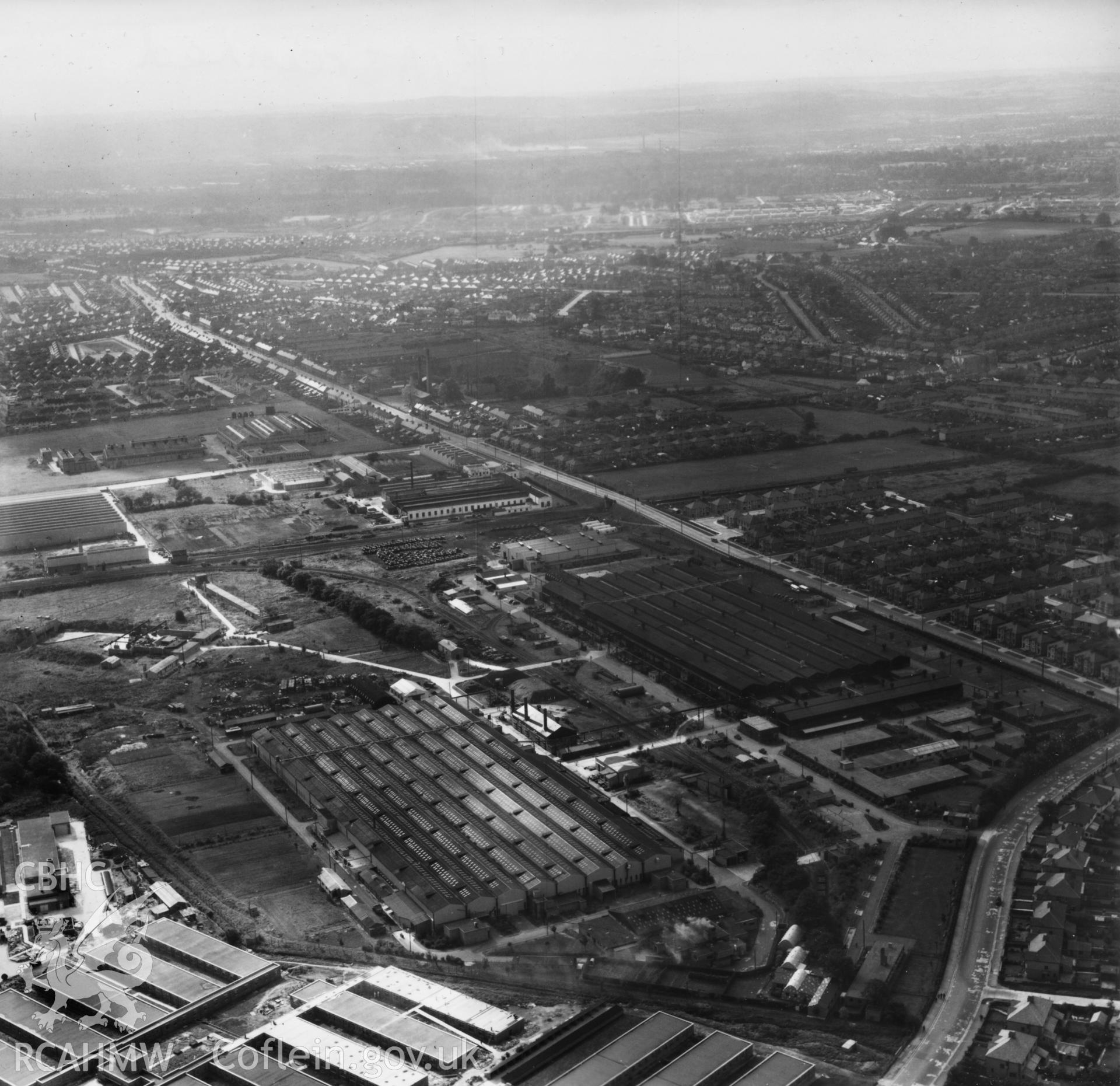 General view of factories and government buildings including the RO factory and new Inland Revenue buildings at Llanishen. Oblique aerial photograph, 5?" cut roll film.