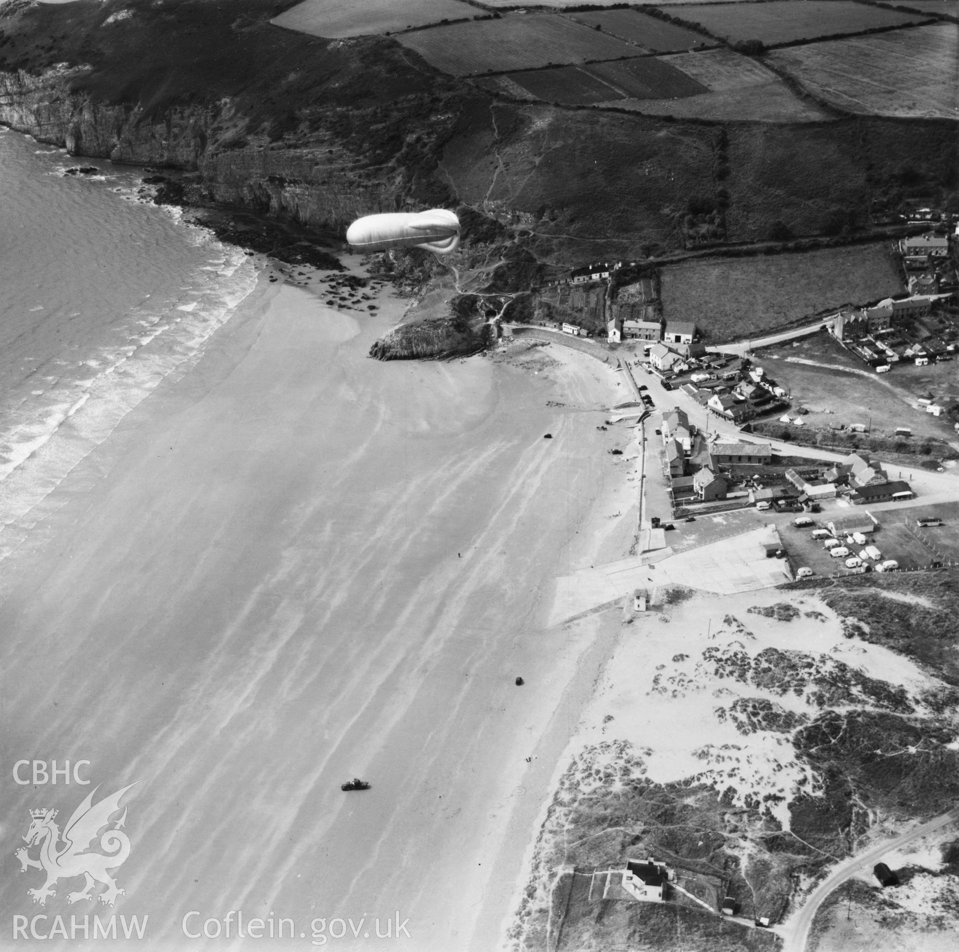 View of Pendine Sands and barrage balloon. Oblique aerial photograph, 5?" cut roll film.