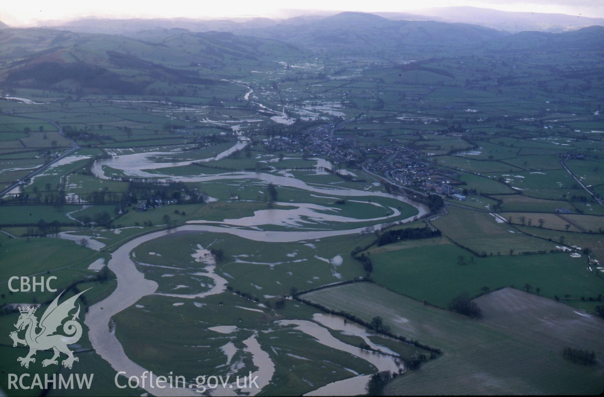 RCAHMW colour slide oblique aerial photograph of Caersws, Caersws, taken by C.R. Musson, 23/01/94