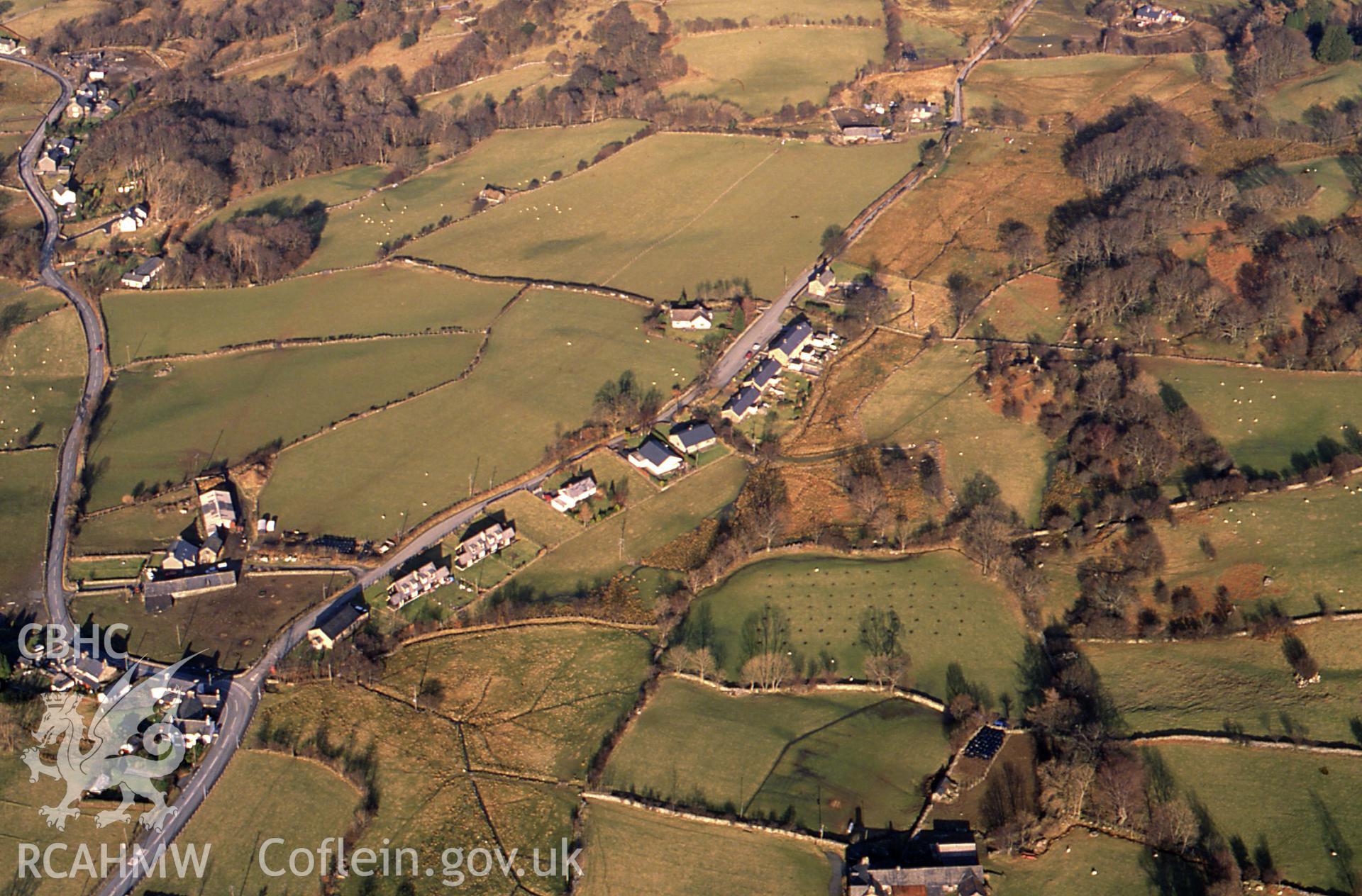 RCAHMW colour slide oblique aerial photograph of Brithdir Roman Site, Brithdir and Llanfachreth, taken on 26/02/1991 by CR Musson