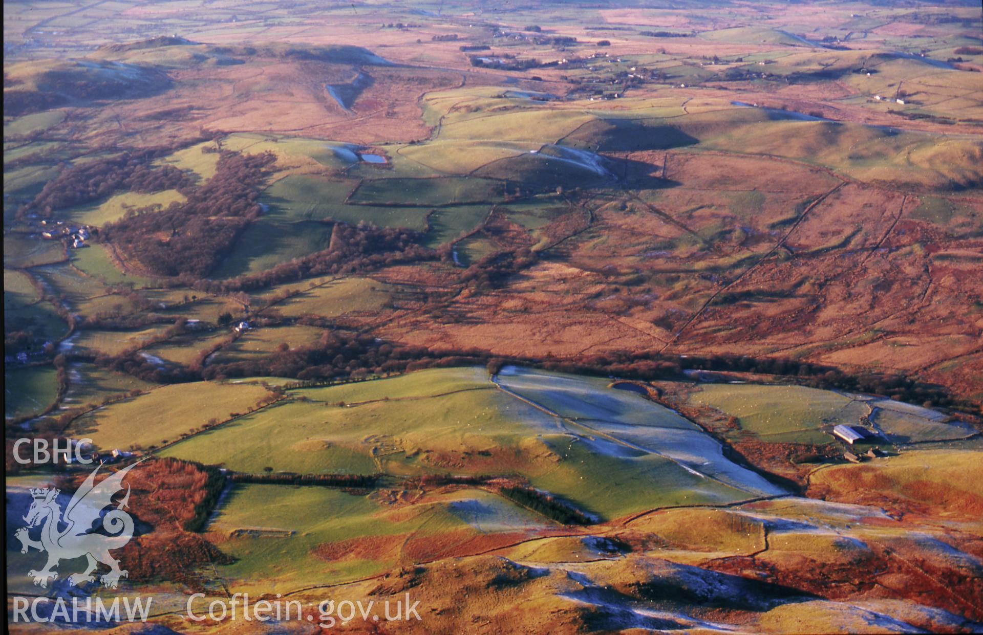 RCAHMW colour slide oblique aerial photograph of a long house, Troed-y-rhiw, Strata Florida, taken on 11/01/1999 by Toby Driver