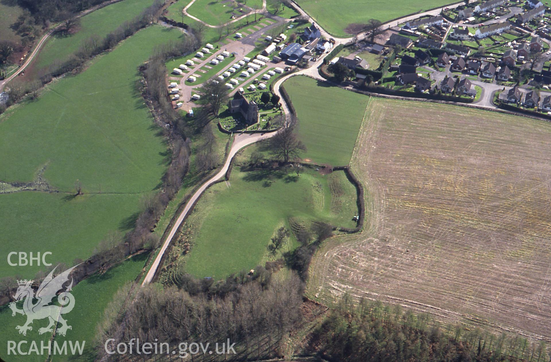 RCAHMW colour slide oblique aerial photograph of Dingestow Castle, Mitchel Troy, taken by C.R. Musson, 24/03/94