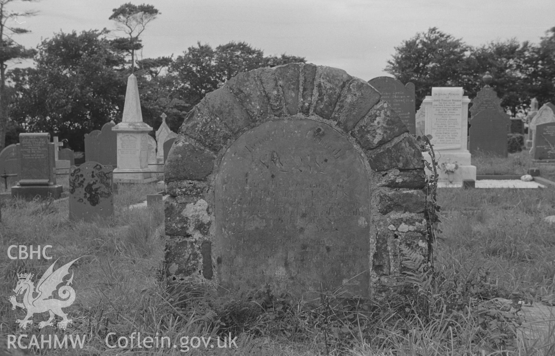 Digital copy of a black and white negative showing gravestone at St. David's Church, Henfynyw, Aberaeron. Photographed by Arthur O. Chater on 5th September 1966 from Grid Reference SN 447 613.