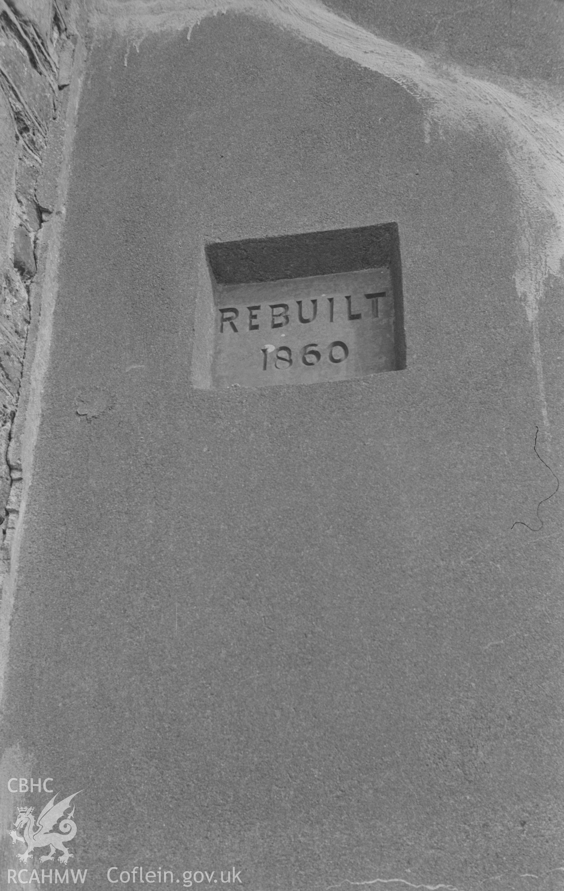 Digital copy of a black and white negative showing inscription for 1860 rebuilding on west wall of nave at St. David's Church, Llanddewi Aberarth. Photographed by Arthur O. Chater on 5th September 1966 looking east from Grid Reference SN 4765 6328.