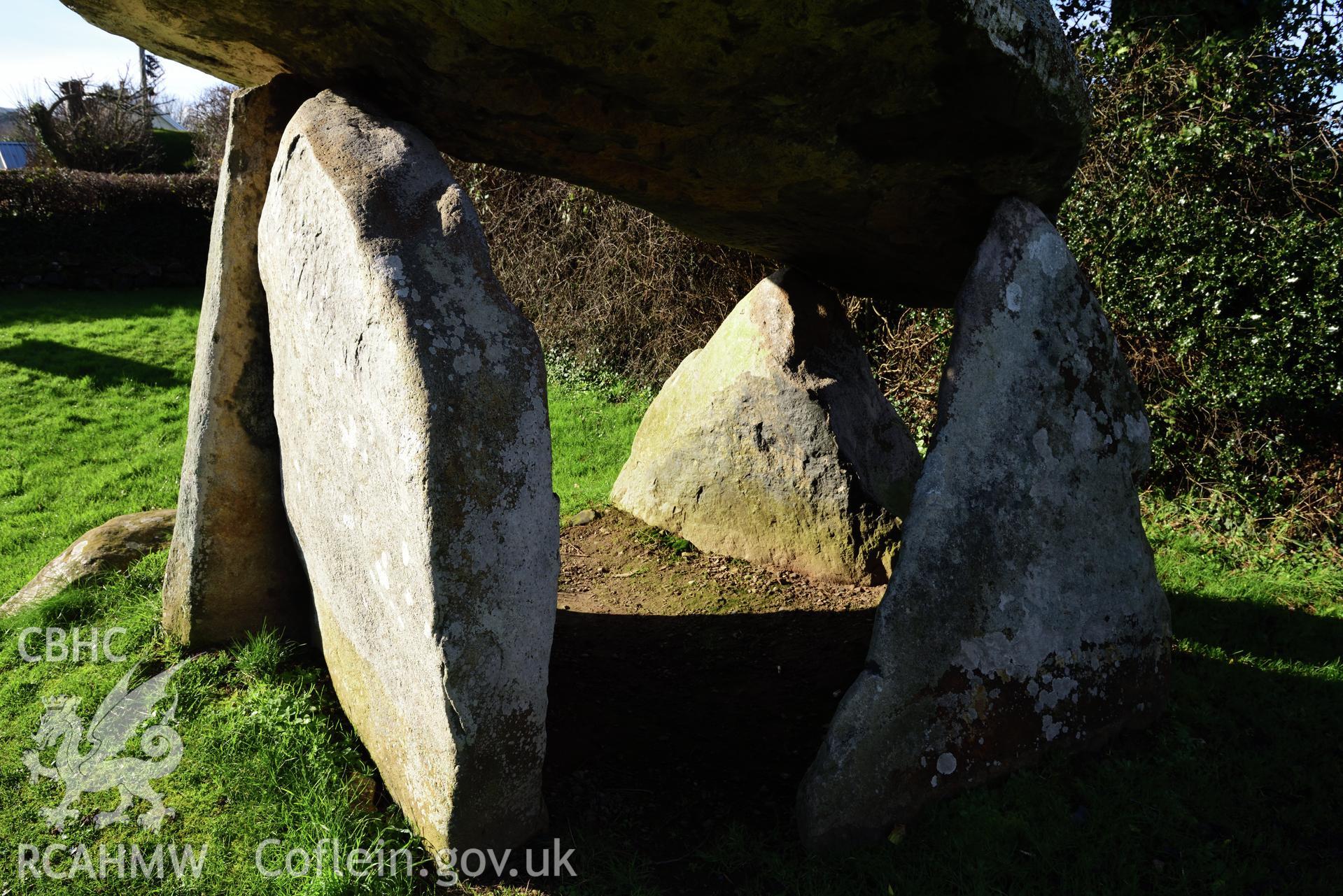 Royal Commission photo survey of Carreg Coetan chambered tomb in winter light, by Toby Driver