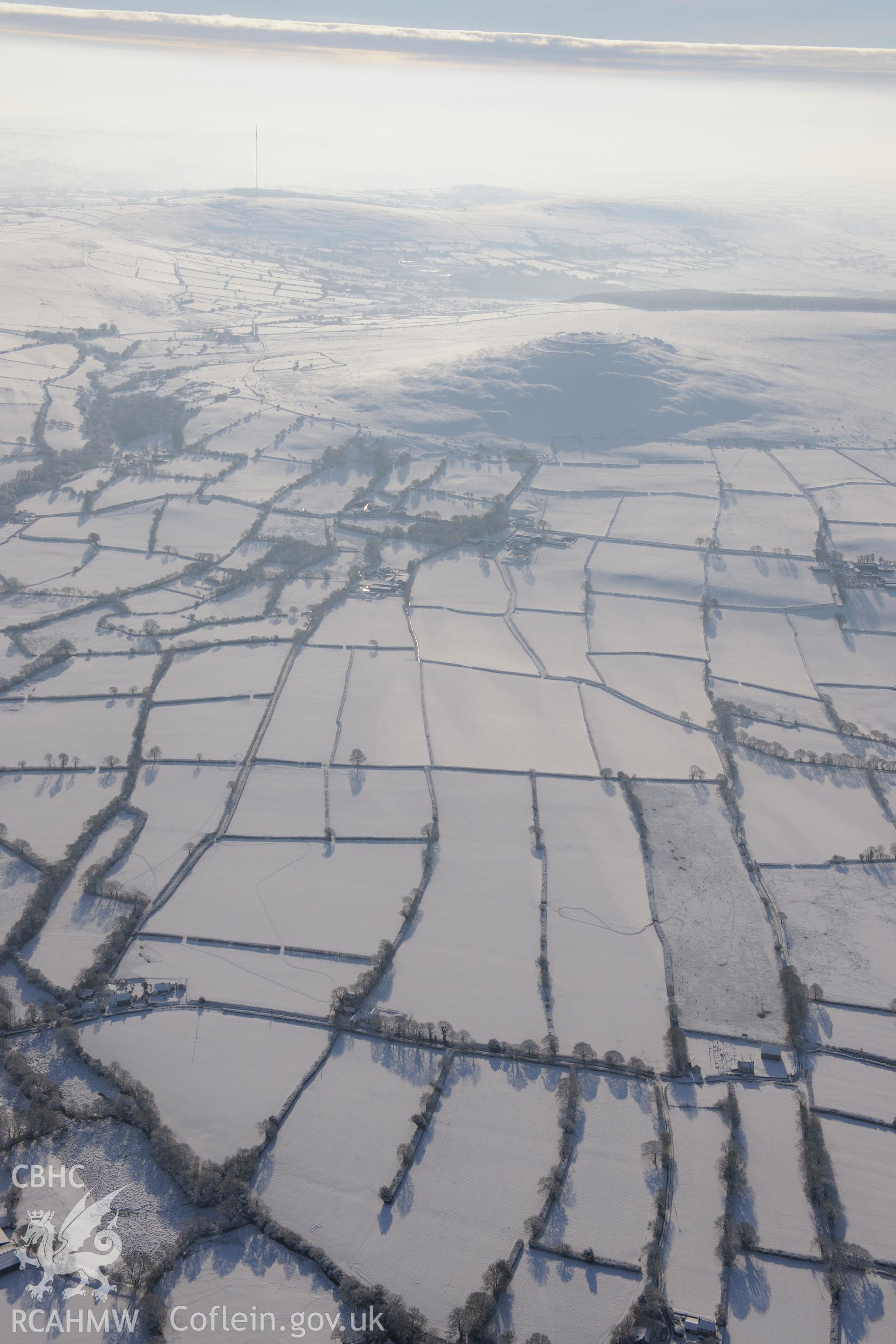 Foel Drygarn Hillfort, east of Crymych. Oblique aerial photograph taken during the Royal Commission?s programme of archaeological aerial reconnaissance by Toby Driver on 24th January 2013.