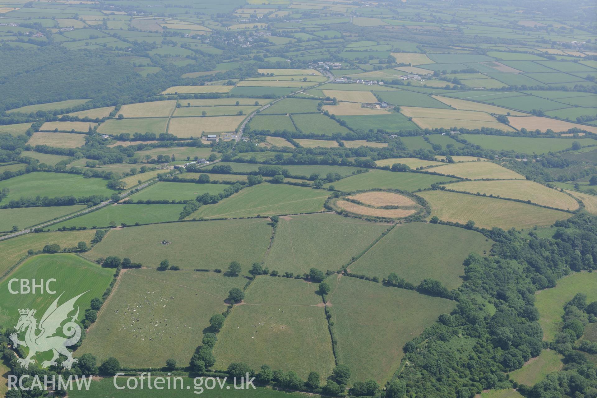 Castell Mawr henge or hillfort, Meline, south west of Cardigan. Oblique aerial photograph taken during the Royal Commission?s programme of archaeological aerial reconnaissance by Toby Driver on 12th July 2013.