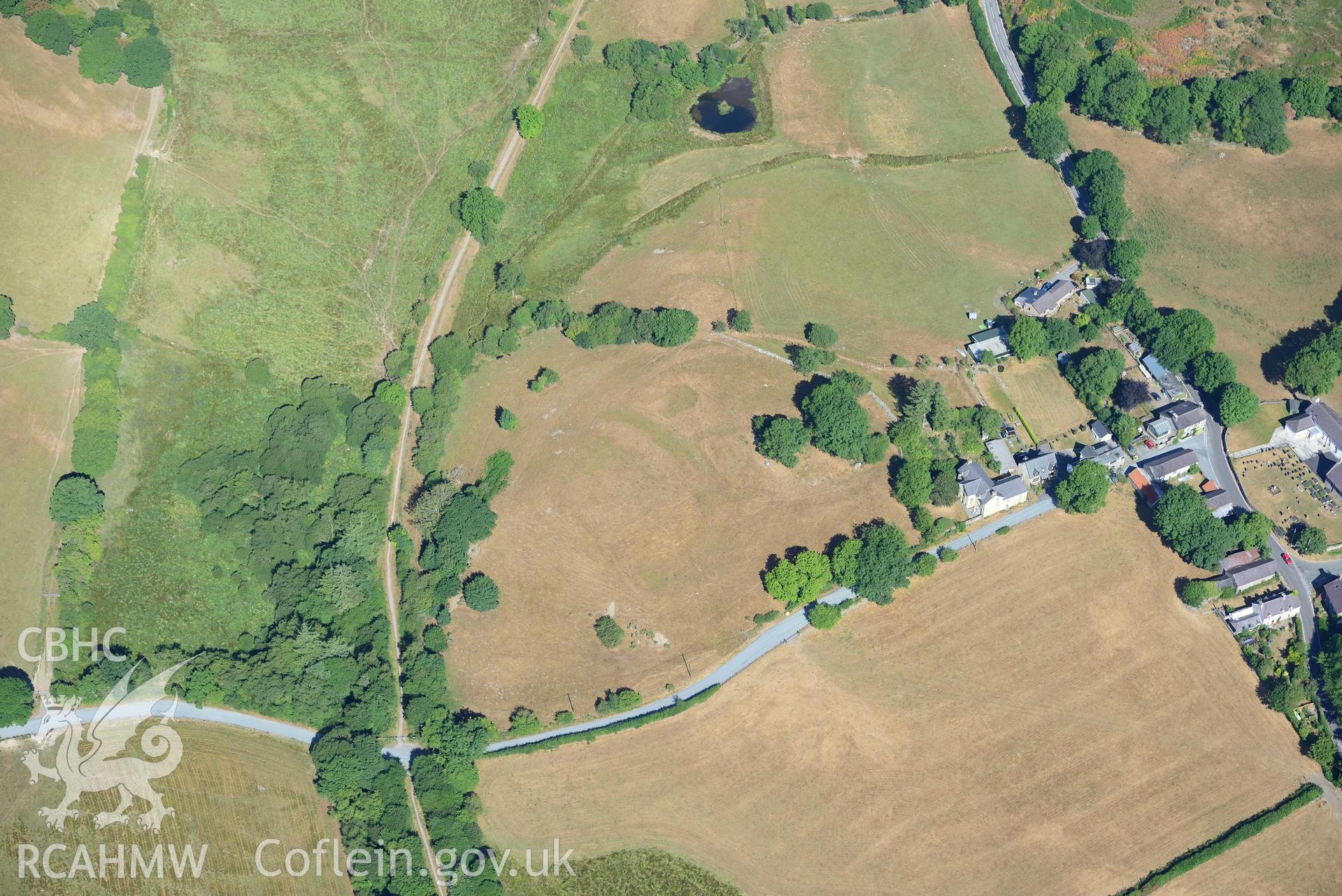 Royal Commission aerial photography of Ystrad Meurig castle and village with extensive parching, taken on 19th July 2018 during the 2018 drought.