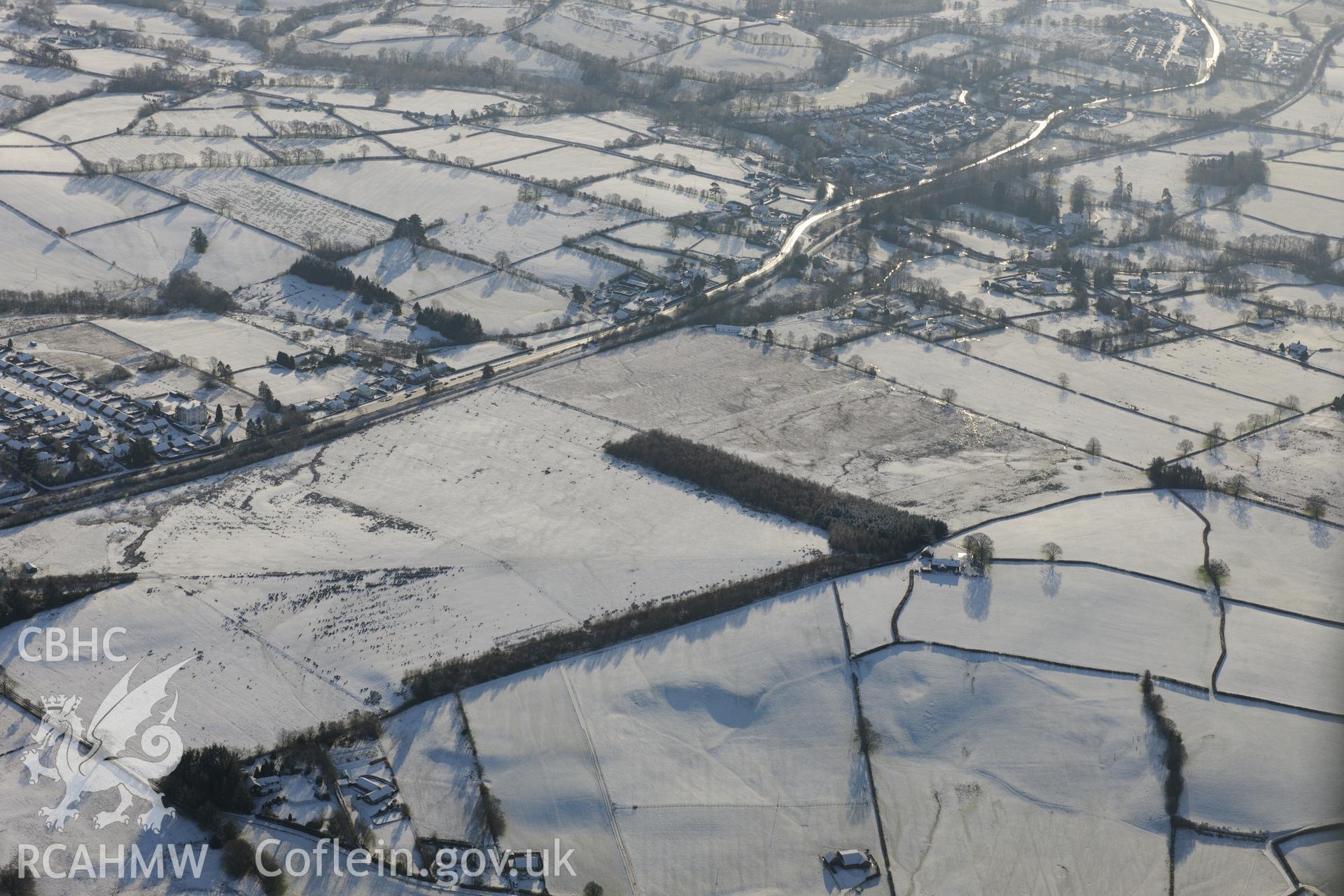 Roman camp XV and Roman road on Llandrindod Common. Oblique aerial photograph taken during the Royal Commission?s programme of archaeological aerial reconnaissance by Toby Driver on 15th January 2013.