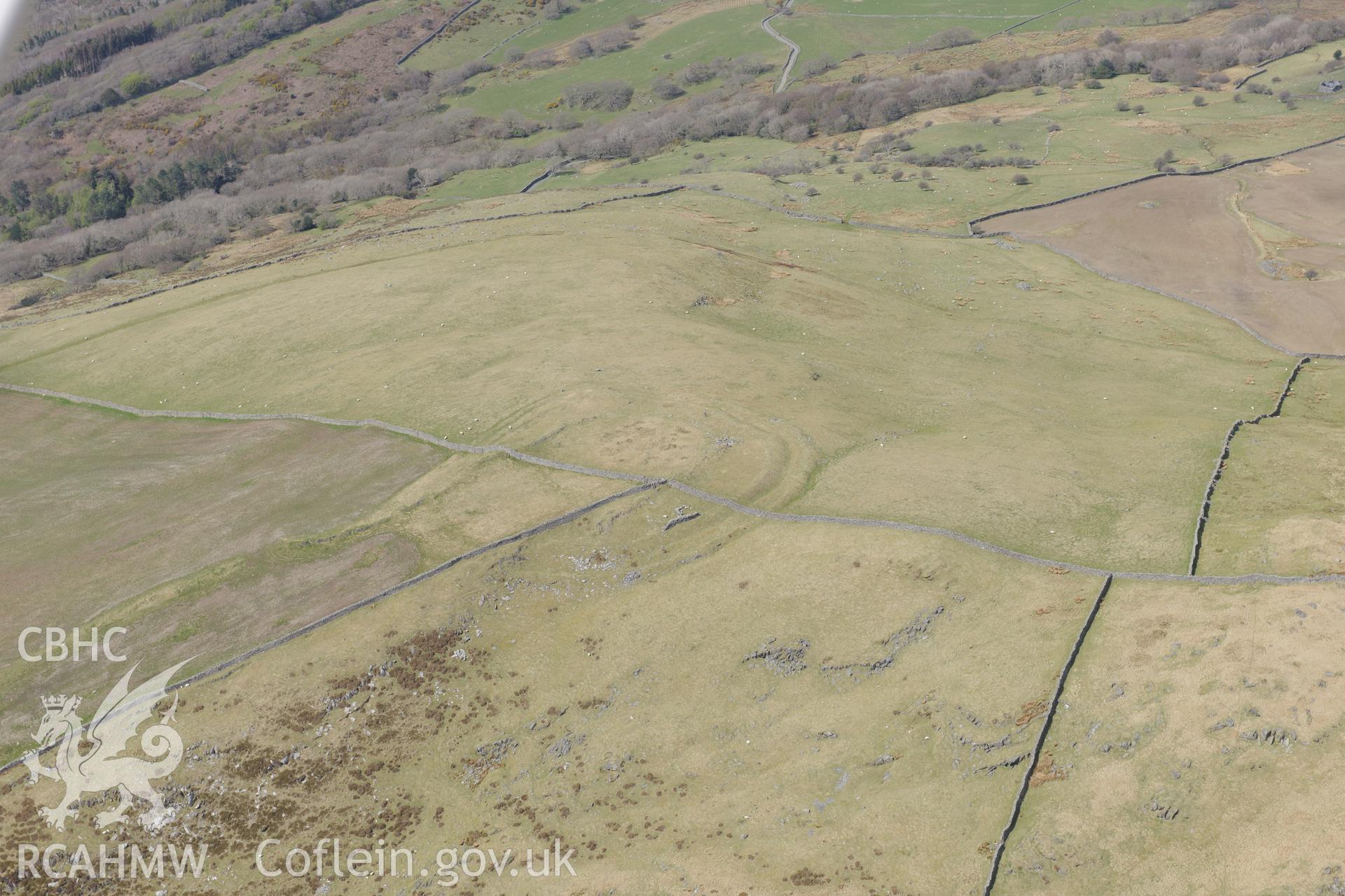 Moel Goedog hillfort, east of Harlech. Oblique aerial photograph taken during the Royal Commission?s programme of archaeological aerial reconnaissance by Toby Driver on 1st May 2013.