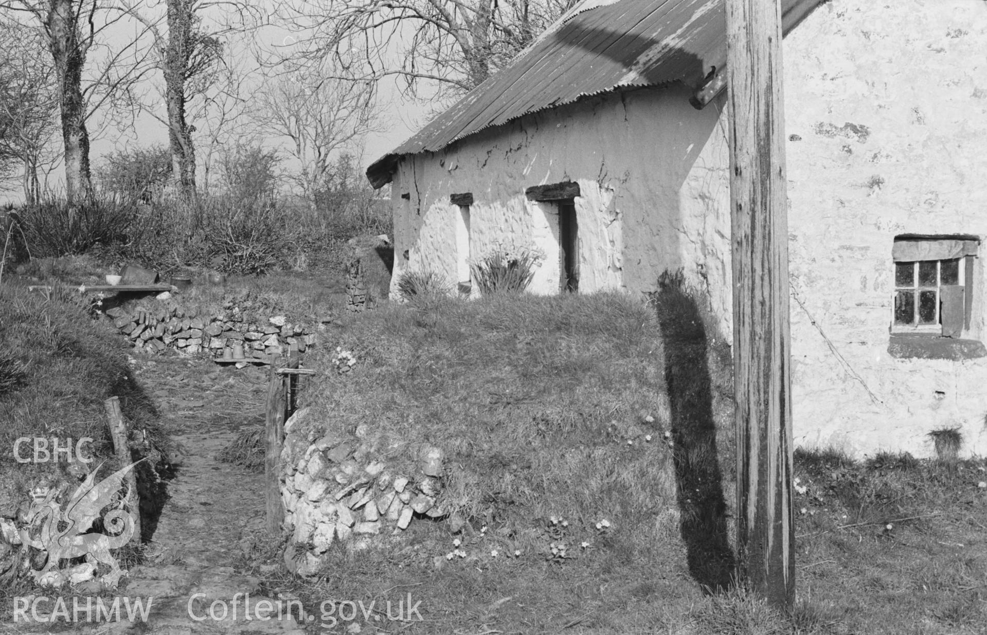 Digital copy of a black and white negative showing Blaen-Sarn-Uchaf, Hafodiwan. Partly mud walled. Photographed by Arthur O. Chater in April 1968 looking east from Grid Reference SN 382 547.