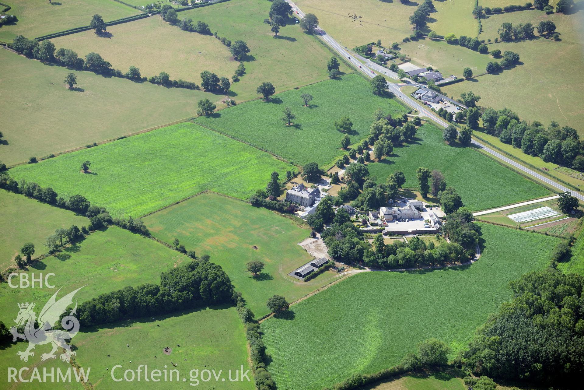 Royal Commission aerial photography of Llanrhaiadr Hall, with cropmarks, taken on 19th July 2018 during the 2018 drought.