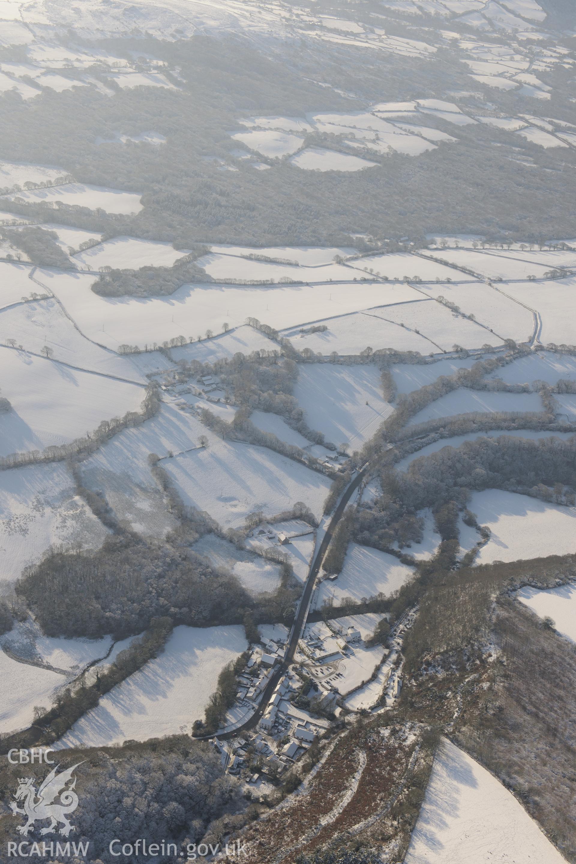 Felindre Farchog, south west of Cardigan. Oblique aerial photograph taken during the Royal Commission?s programme of archaeological aerial reconnaissance by Toby Driver on 24th January 2013.