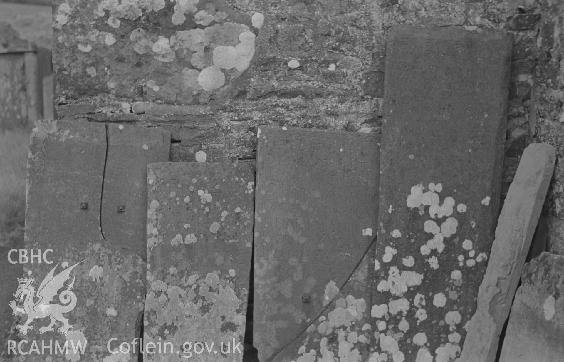 Digital copy of a black and white negative showing gravestones at St. Patrick's church, Pencarreg, Lampeter. Photographed in September 1963 by Arthur O. Chater.