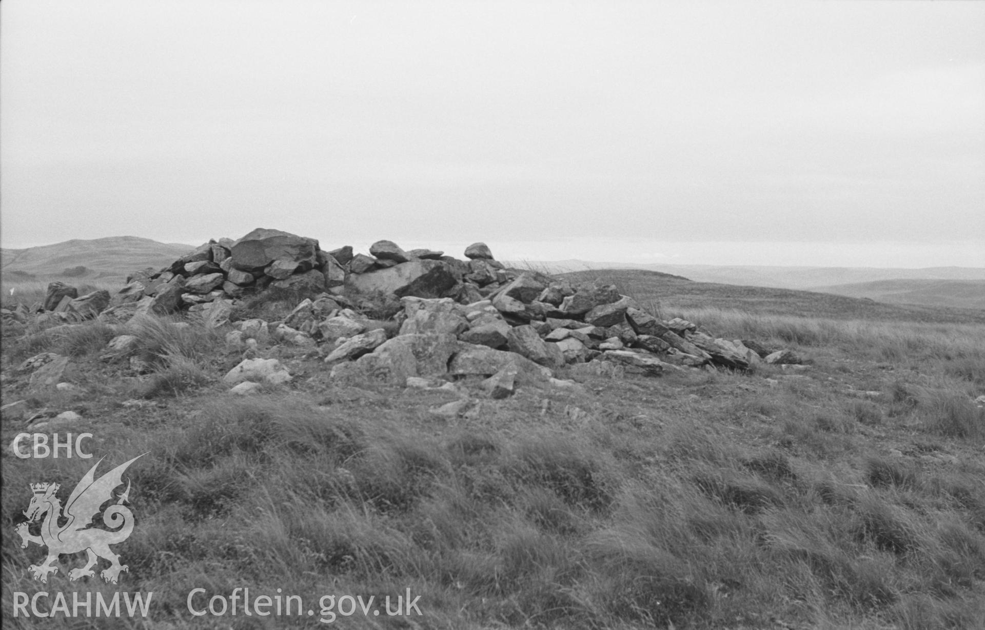 Digital copy of a black and white negative showing Esgair Fraith cairn field, east of Lampeter. Photographed by Arthur O. Chater in August 1965.