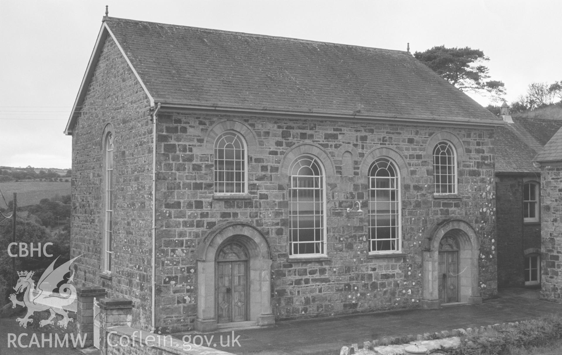 Digital copy of a black and white negative showing exterior view of Penmorfa Welsh Calvinistic Methodist Chapel, Penmorfa, Penbryn. Photographed by Arthur O. Chater on 10th September 1966, looking south west from Grid Reference SN 3051 5220.