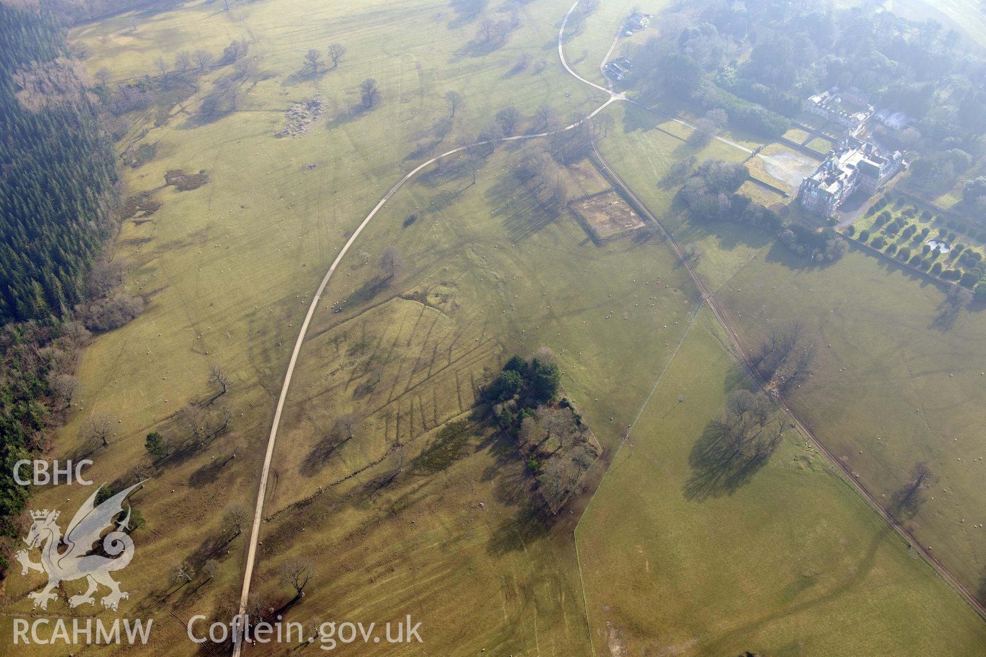 Garden, Venetian Garden, Hall and First World War practise trenches at Kinmel Park, Bodelwyddan, between Abergele and St. Asaph. Oblique aerial photograph taken during RCAHMW?s programme of archaeological aerial reconnaissance by Toby Driver, 28 Feb 2013.