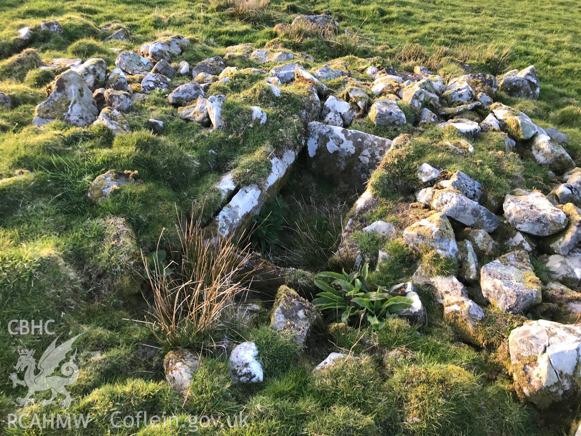 Colour photograph of western cairn at Cae'r Arglwydd on Moel y Garn, north east of Talybont, taken by Paul R. Davis on 26th February 2019.