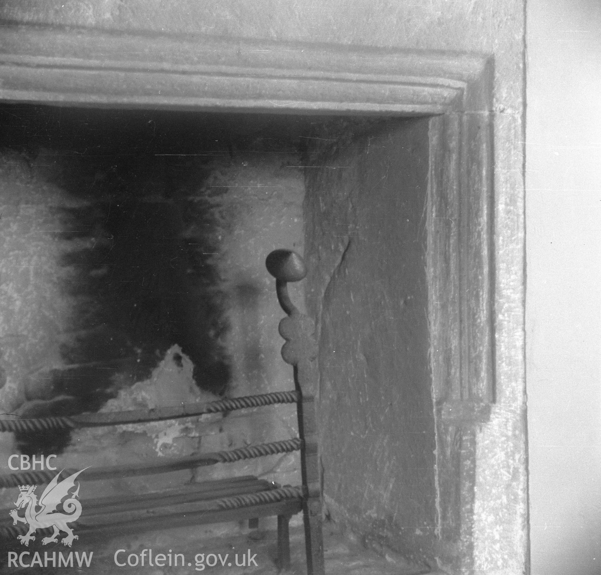 Digital copy of an undated nitrate negative showing carved stone fireplace at Treowen, Monmouthshire.