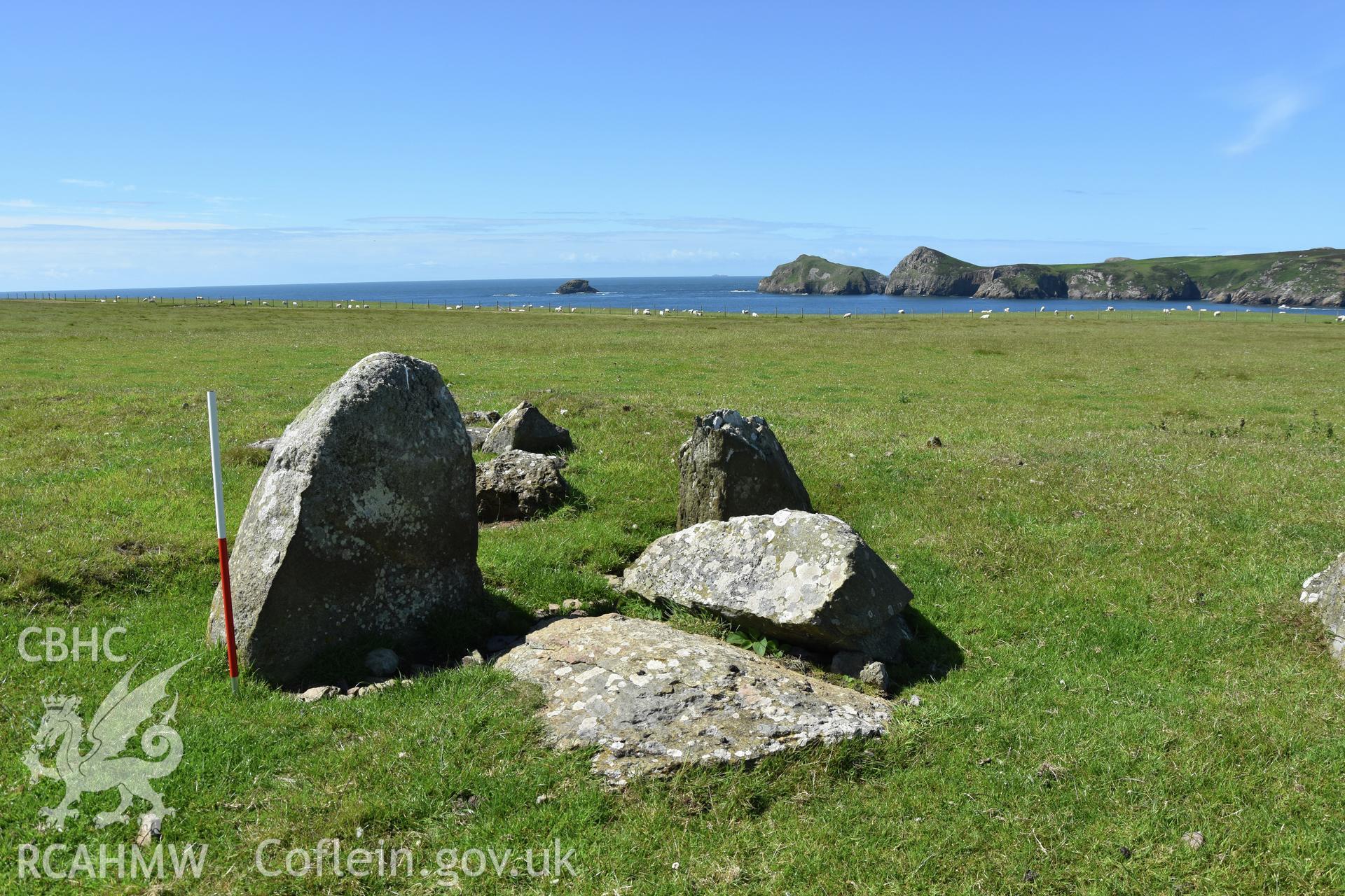 Lower Treginnis chambered tomb, view looking south-west over Ramsey Sound. Investigator?s photographic survey for the CHERISH Project. ? Crown: CHERISH PROJECT 2019. Produced with EU funds through the Ireland Wales Co-operation Programme 2014-2020. All material made freely available through the Open Government Licence.