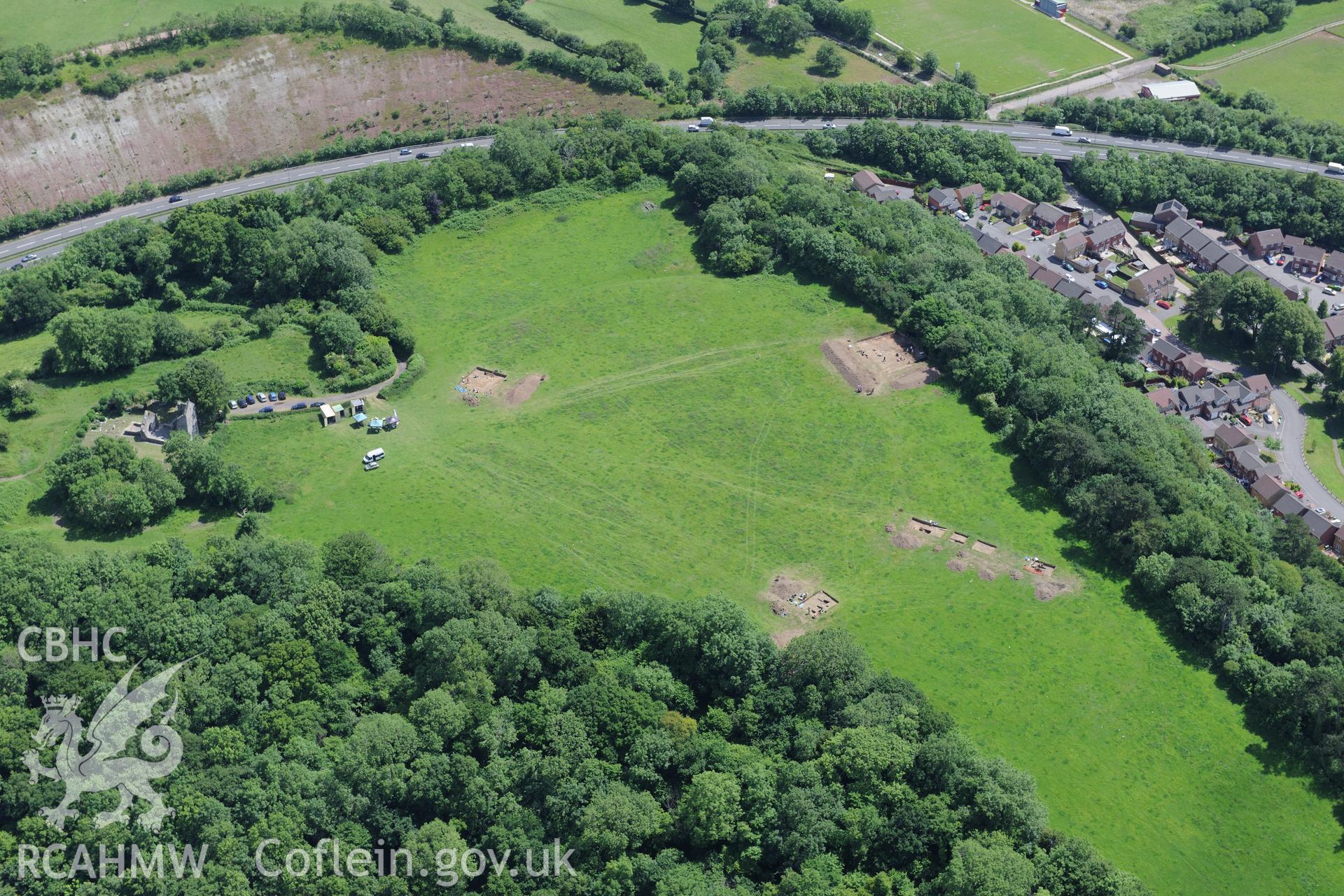 Excavation of Caerau Hillfort, Ely, conducted by Cardiff University. Oblique aerial photograph taken during the Royal Commission's programme of archaeological aerial reconnaissance by Toby Driver on 29th June 2015.