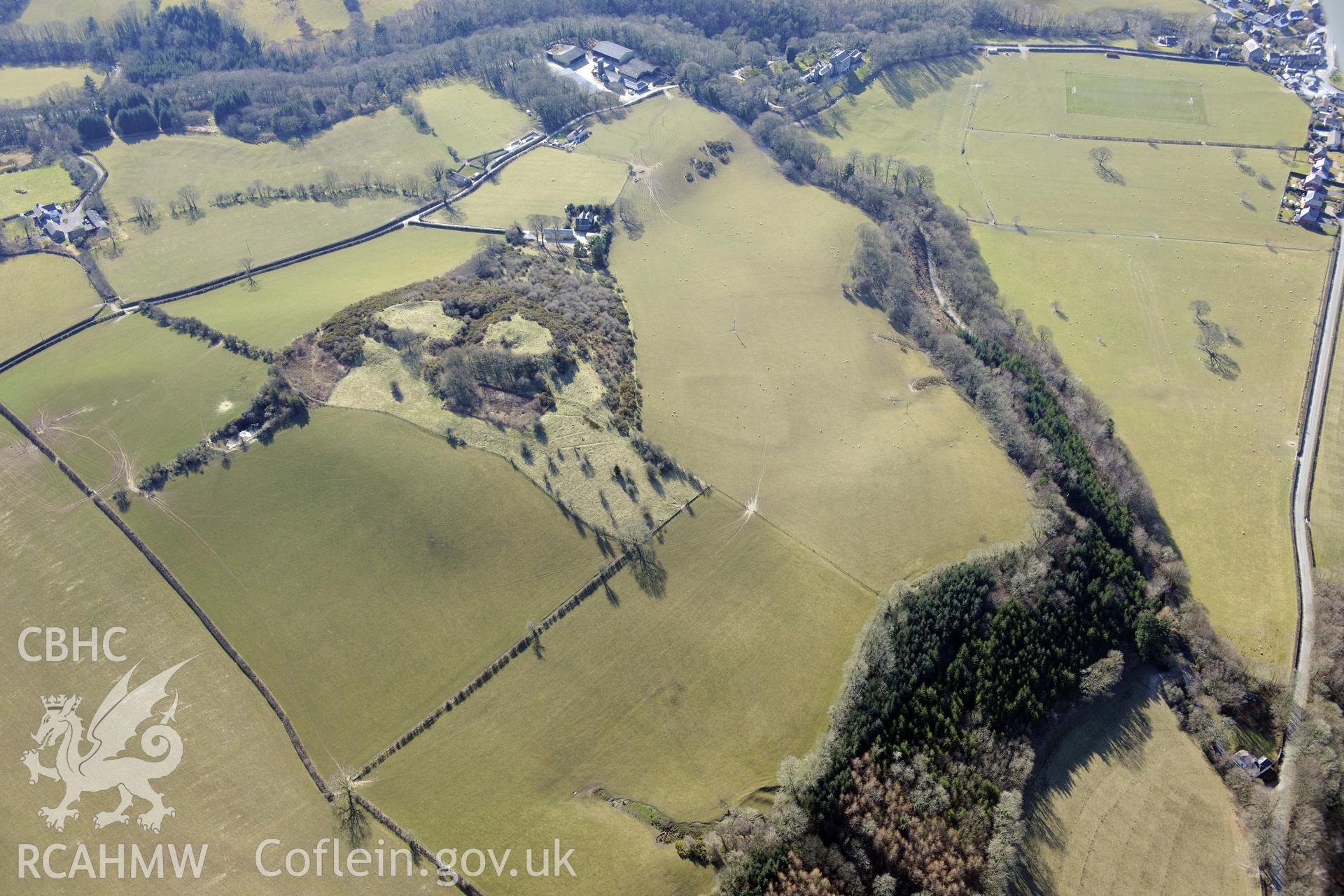 Pen-y-Castell hillfort and a defended enclosure to its north, Llanilar, south east of Aberystwyth. Oblique aerial photograph taken during the Royal Commission's programme of archaeological aerial reconnaissance by Toby Driver on 2nd April 2013.