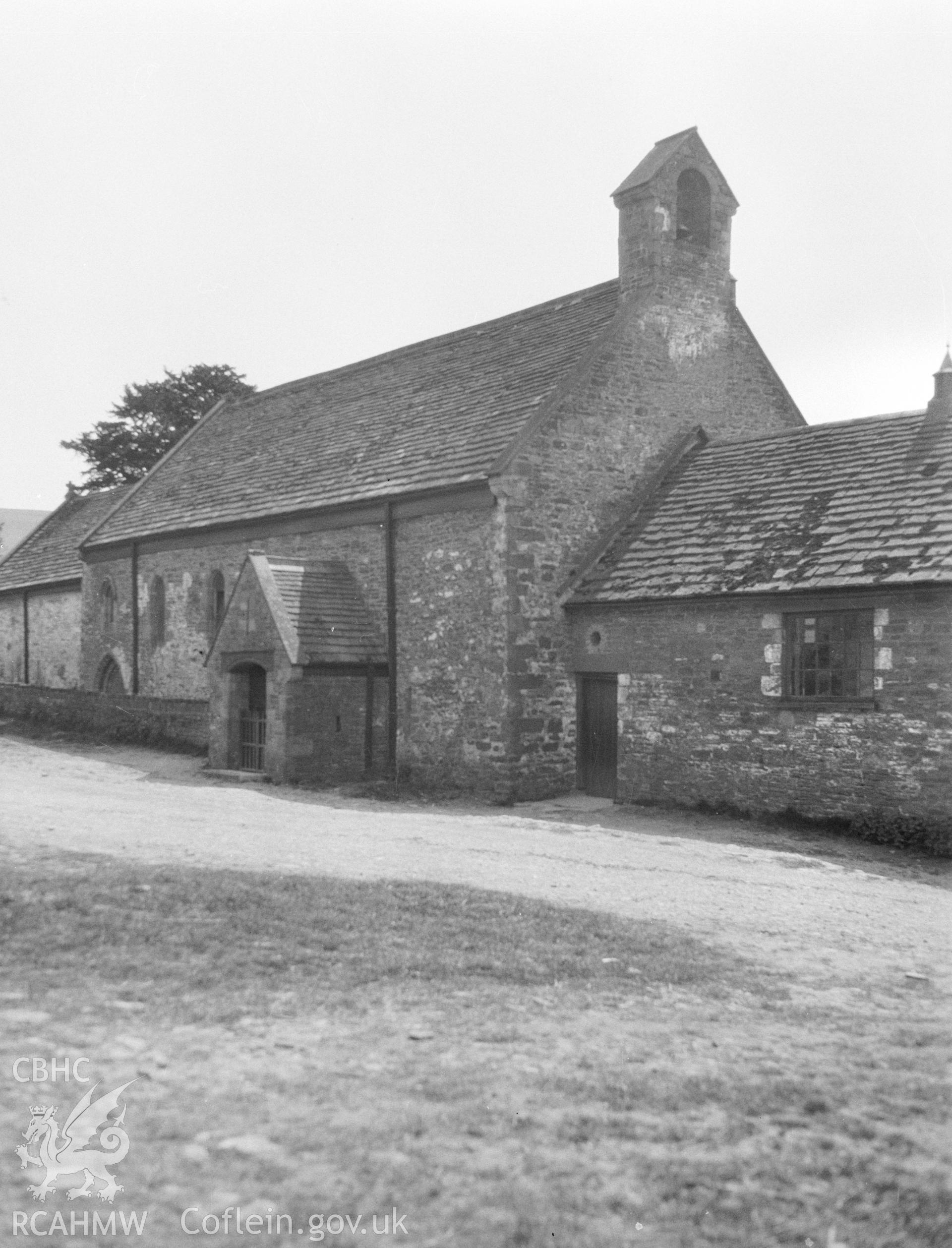 Digital copy of a nitrate negative showing exterior view of front elevation of St David, Llanthony. From the National Building Record Postcard Collection.