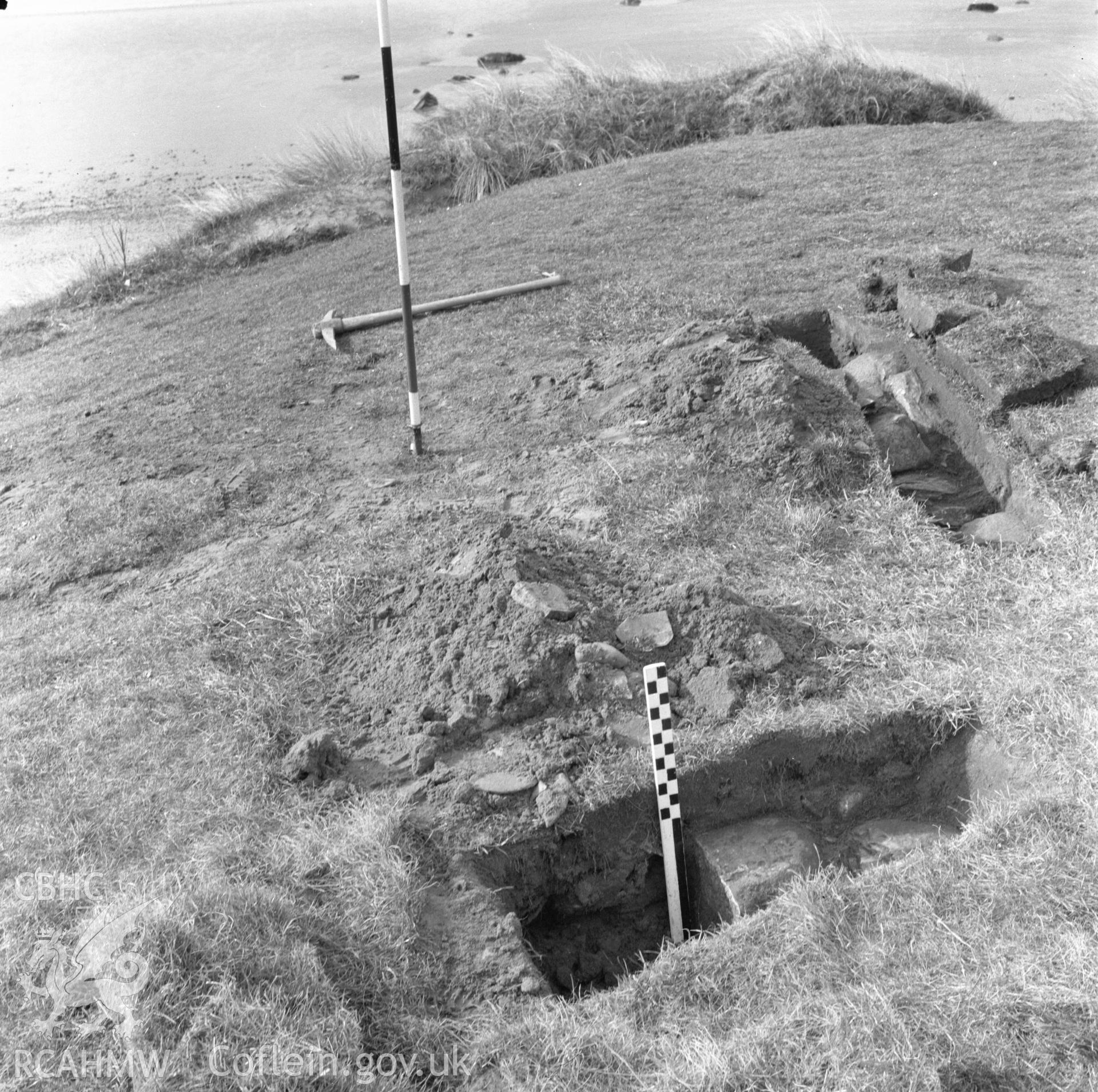 Digital copy of a black and white negative showing excavation at St. Patrick's Chapel, Whitesands Bay, Pembrokeshire taken February 1970.