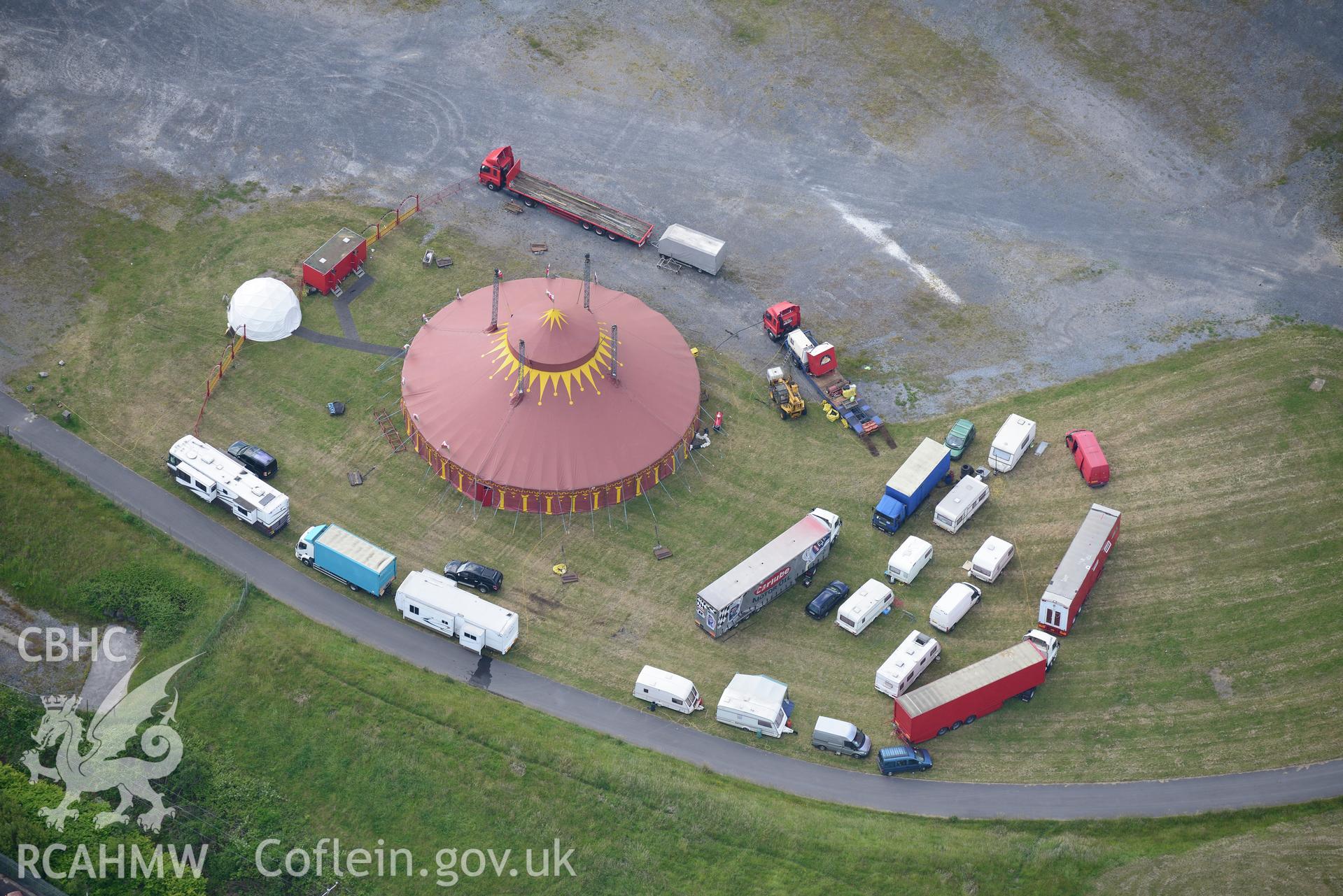 Circus on the site of the 2014 National Eisteddfod, at Sandy Water Park, Llanelli. Oblique aerial photograph taken during the Royal Commission's programme of archaeological aerial reconnaissance by Toby Driver on 19th June 2015.