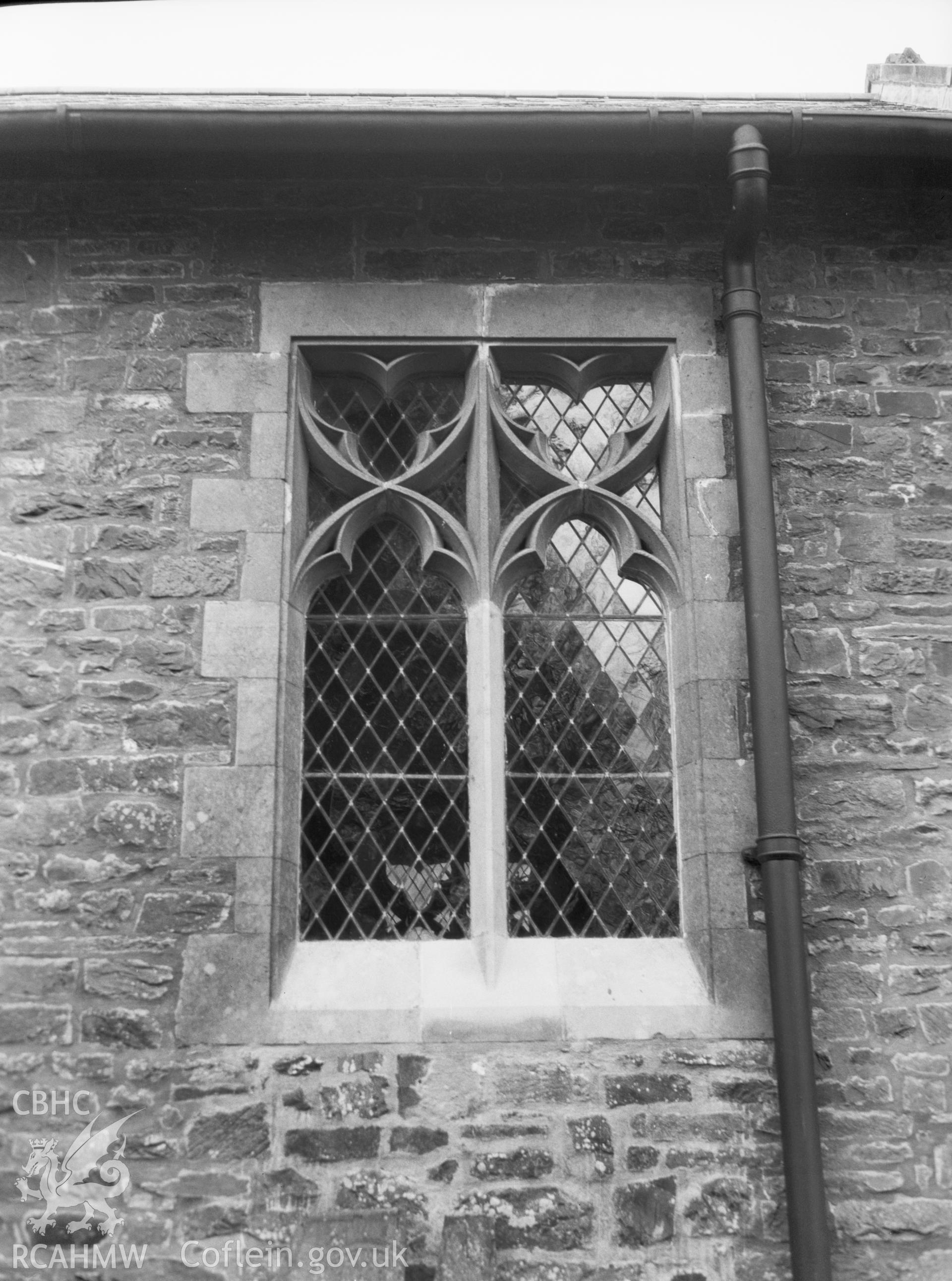 Digital copy of a nitrate negative showing exterior view of south leaded window, St Anno's Church, Llananno. From the National Building Record Postcard Collection.