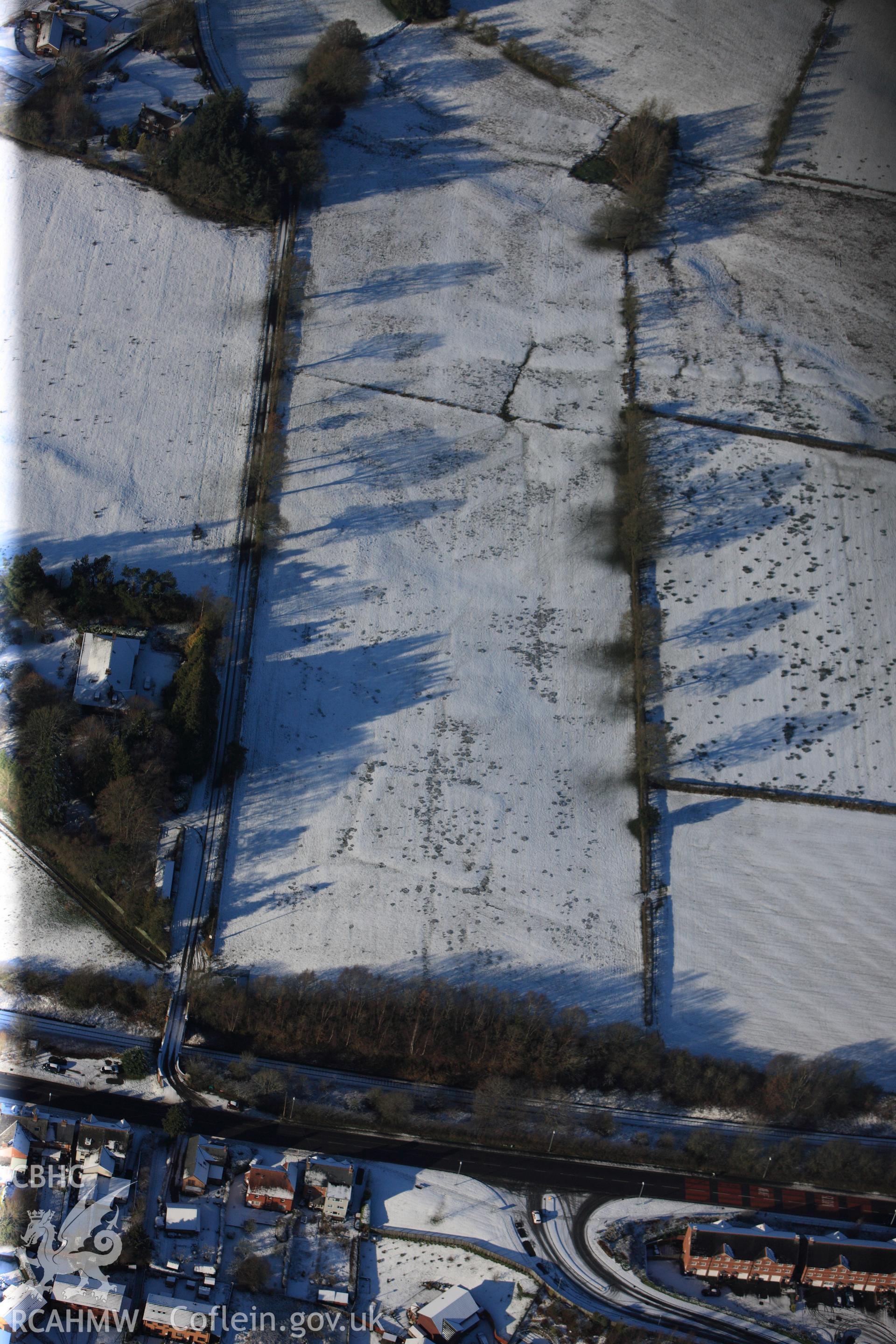 Roman camps IX; XI and XX on Llandrindod Common. Oblique aerial photograph taken during the Royal Commission?s programme of archaeological aerial reconnaissance by Toby Driver on 15th January 2013.