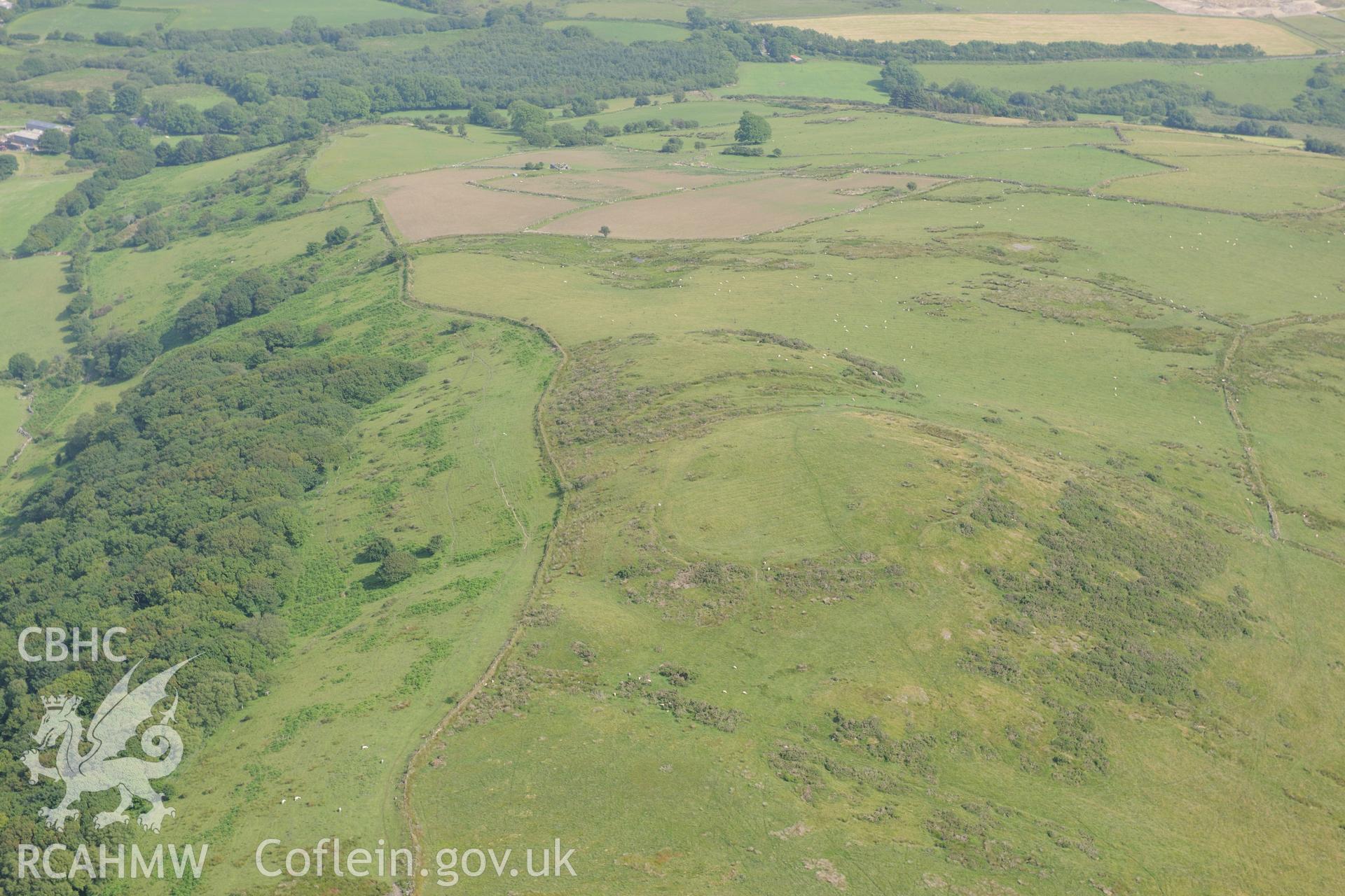 Y Foel Camp defended enclosure, Llanllyfni, south of Caernarfon. Oblique aerial photograph taken during the Royal Commission?s programme of archaeological aerial reconnaissance by Toby Driver on 12th July 2013.