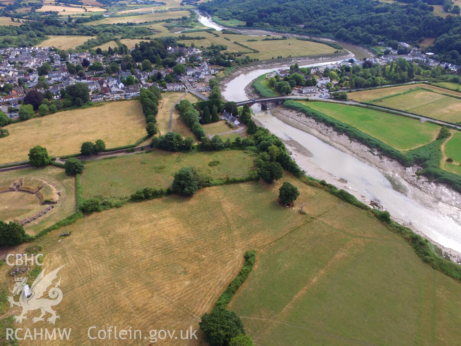 Colour photograph showing the remains of Isca Leginary Fortress, now the town of Caerleon. Photograph includes view of the Roman amphitheatre and the Caerleon road bridge. Taken by Paul R. Davis on 22nd July 2018.