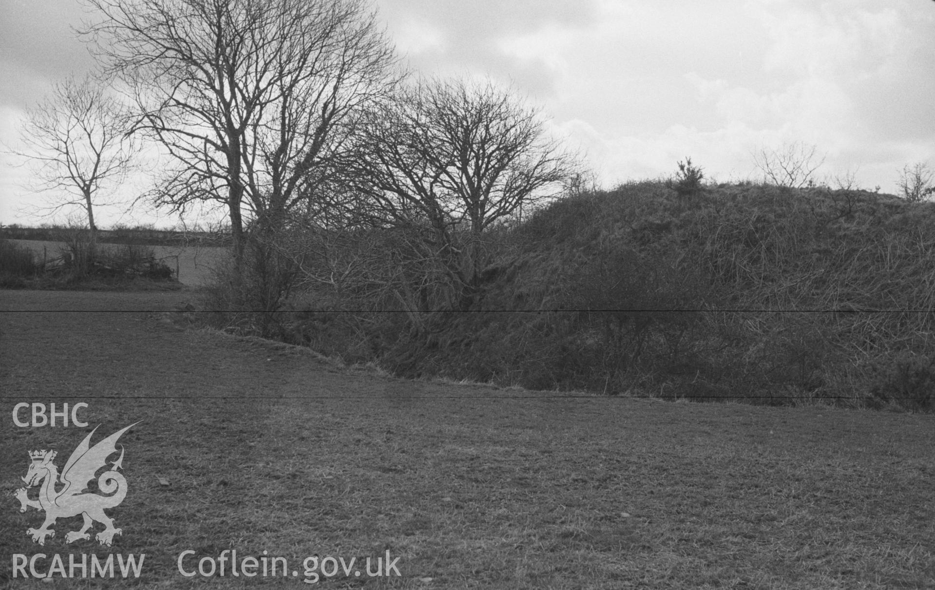 Digital copy of black & white negative showing Norman motte 100m north east of the site of St Mary's Church, Llanfair Trefhelygen. Photographed in April 1963 by Arthur O. Chater from Grid Reference SN 3447 4420, looking north west. Panorama (photo 1 of 3).