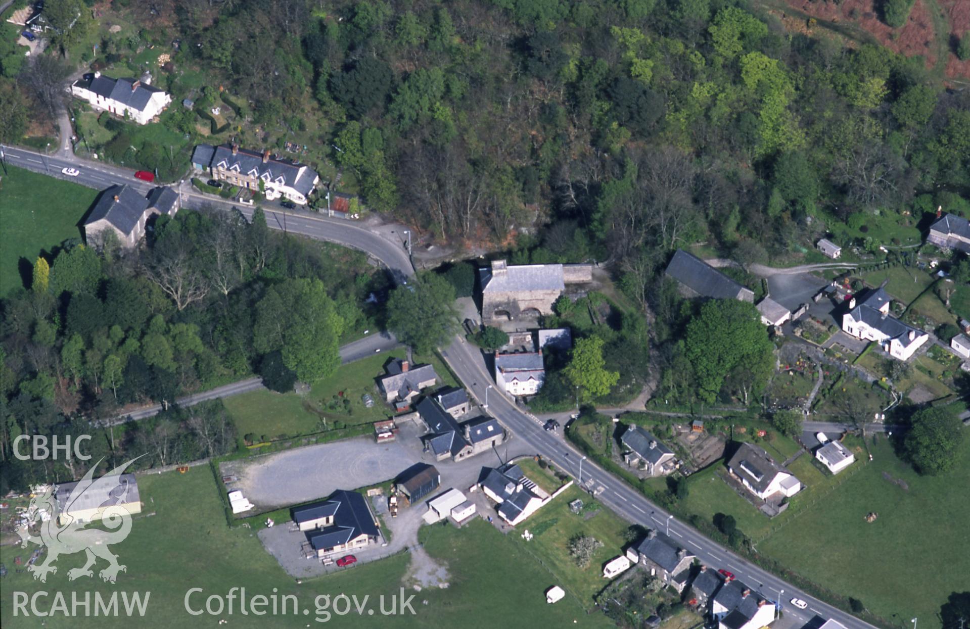 RCAHMW colour slide oblique aerial photograph of Furnace, Ysgubor-y-coed, taken on 29/04/1999 by Toby Driver