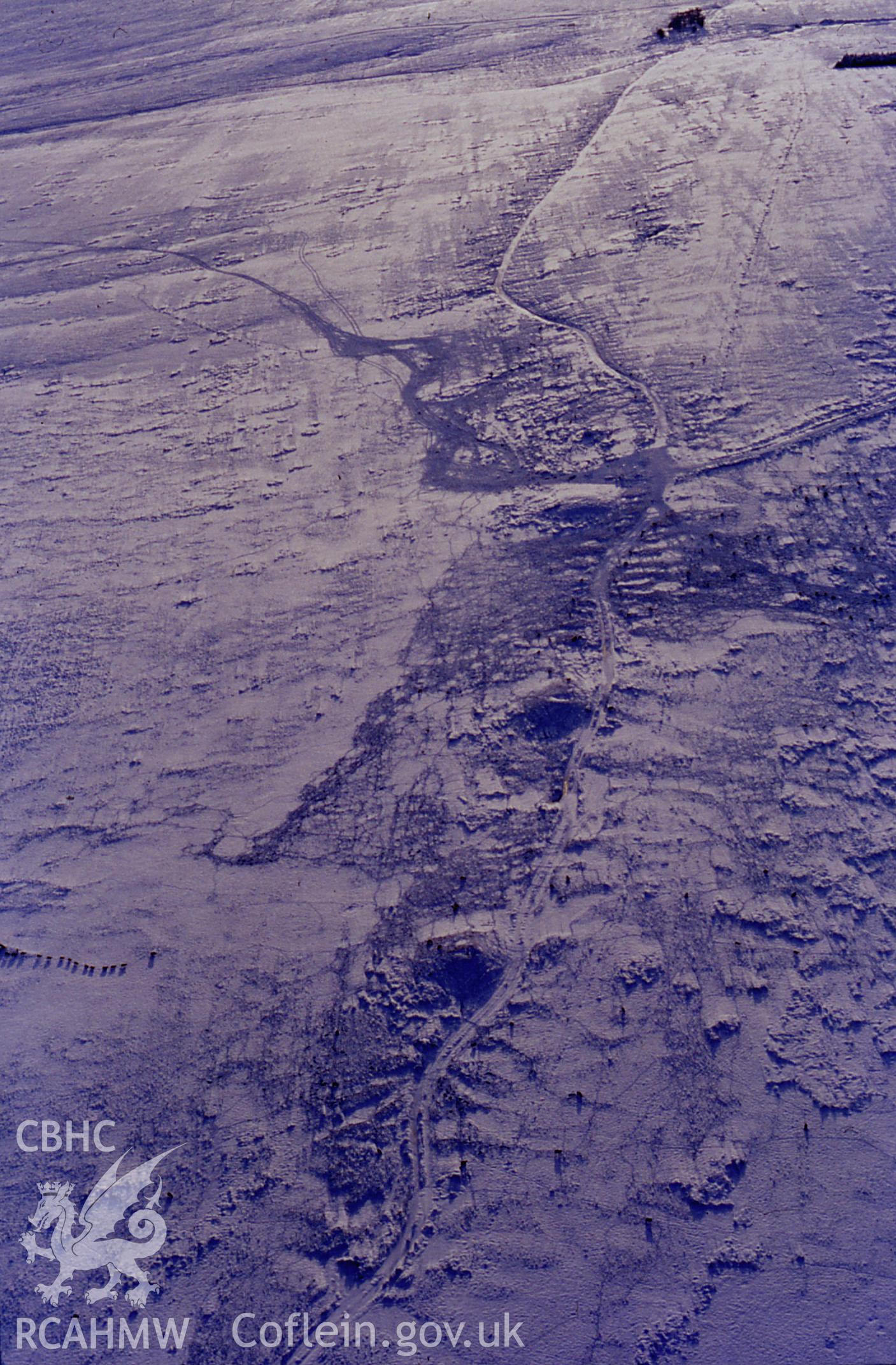 RCAHMW colour slide oblique aerial photograph of Tri Chrugiau Cairn II, Llangamarch, taken on 11/01/1992 by CR Musson