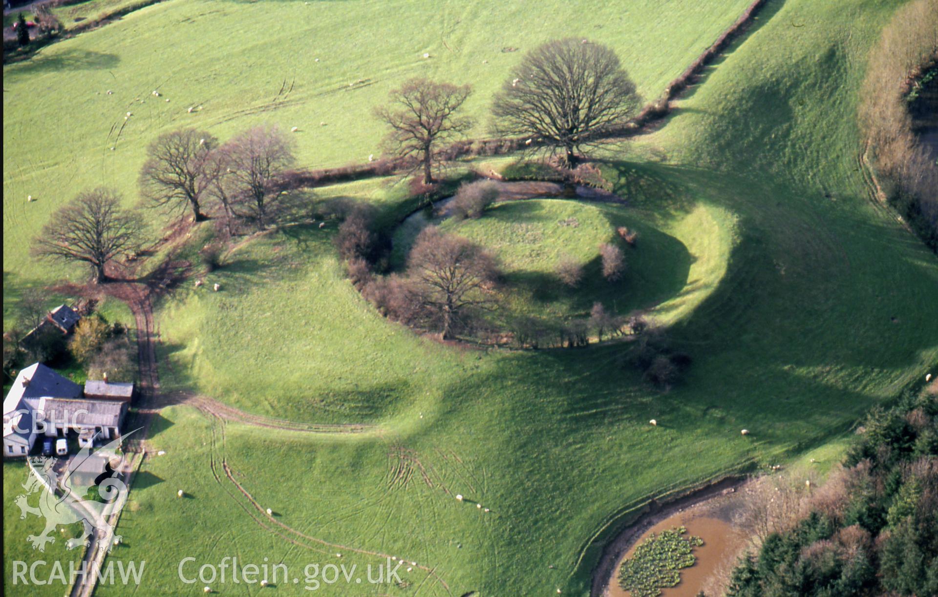 Slide of RCAHMW colour oblique aerial photograph of Sycharth Castle, taken by C.R. Musson, 4/4/1993.