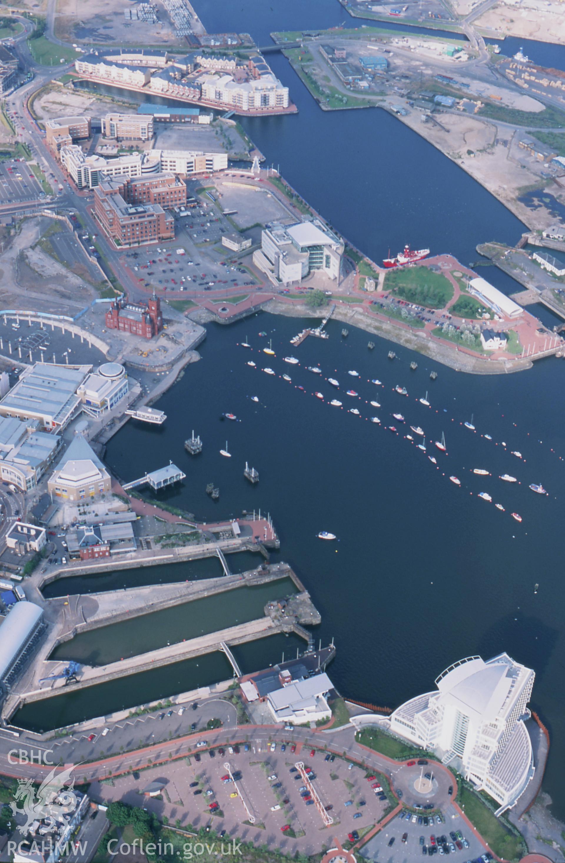 Slide of RCAHMW colour oblique aerial photograph of Bute Docks Offices, Pier Head Building And Cardiff Bay, taken by T.G. Driver, 18/7/2000.