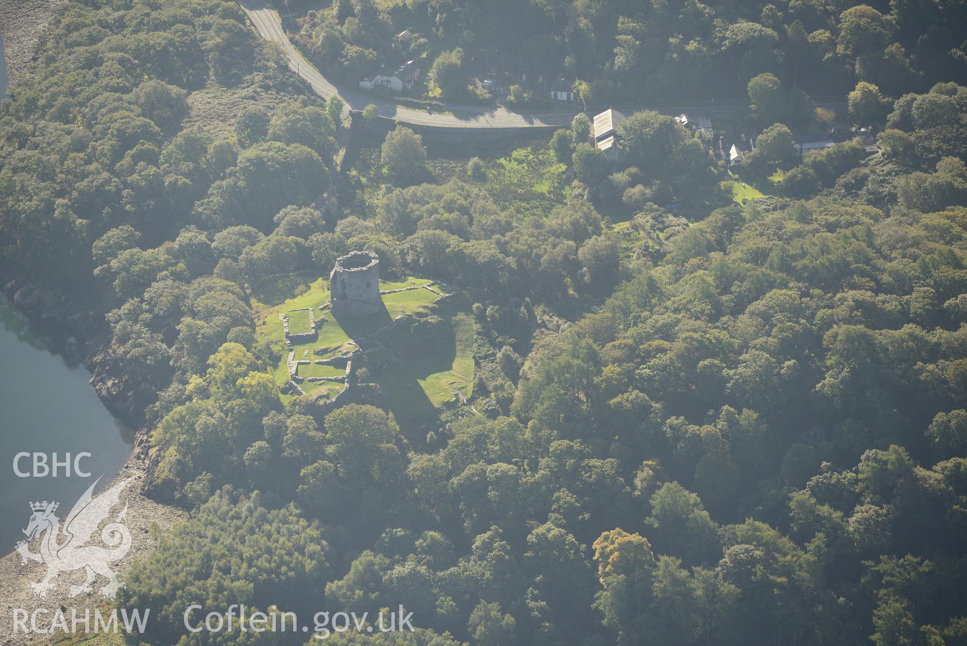 Dolbadarn Castle on the shore of Llyn Peris, Llanberis. Oblique aerial photograph taken during the Royal Commission's programme of archaeological aerial reconnaissance by Toby Driver on 2nd October 2015.