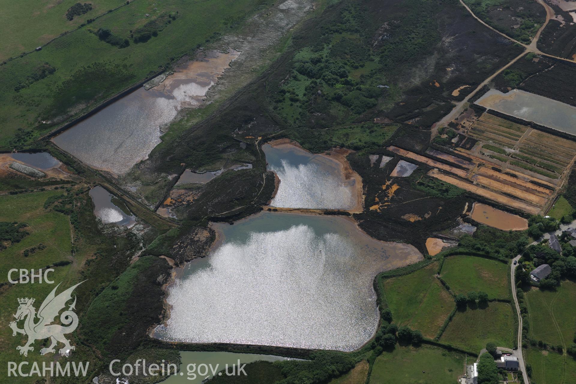 Parys Mountain copper mines, Amlwch, Anglesey. Oblique aerial photograph taken during the Royal Commission?s programme of archaeological aerial reconnaissance by Toby Driver on 12th July 2013.