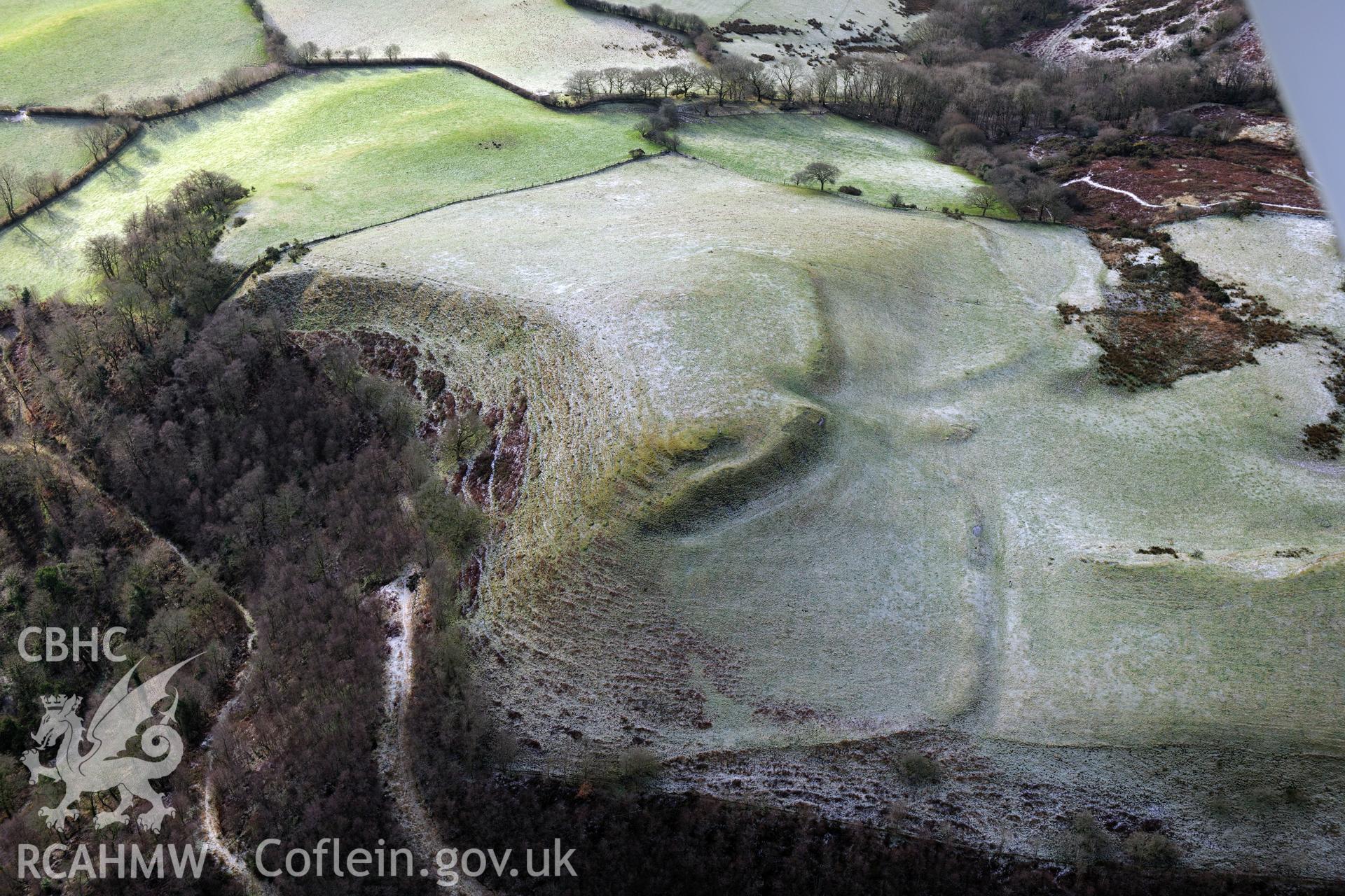 Y Fan hillfort, Llansadwrn, south west of Llandovery. Oblique aerial photograph taken during the Royal Commission?s programme of archaeological aerial reconnaissance by Toby Driver on 15th January 2013.